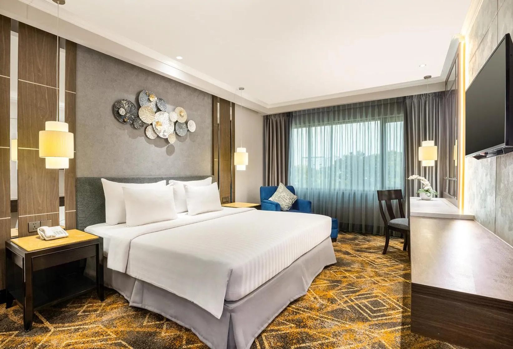 Bed in Aston Tropicana Hotel Bandung