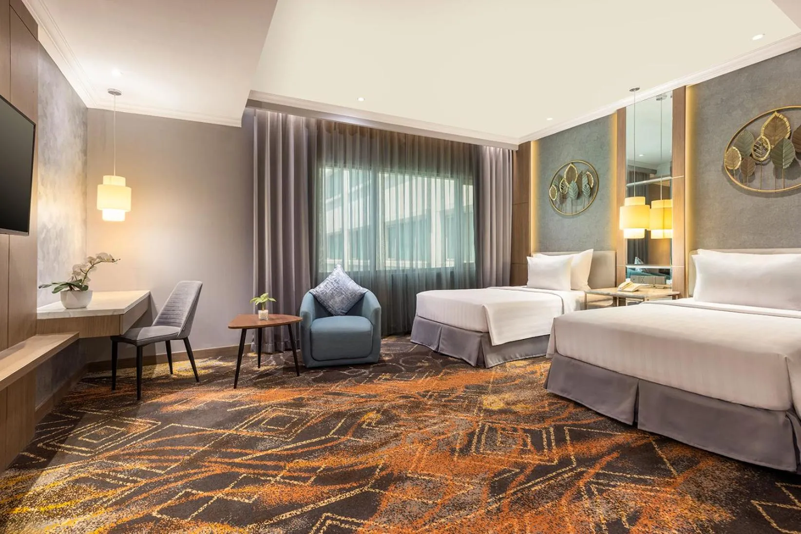 Bed in Aston Tropicana Hotel Bandung