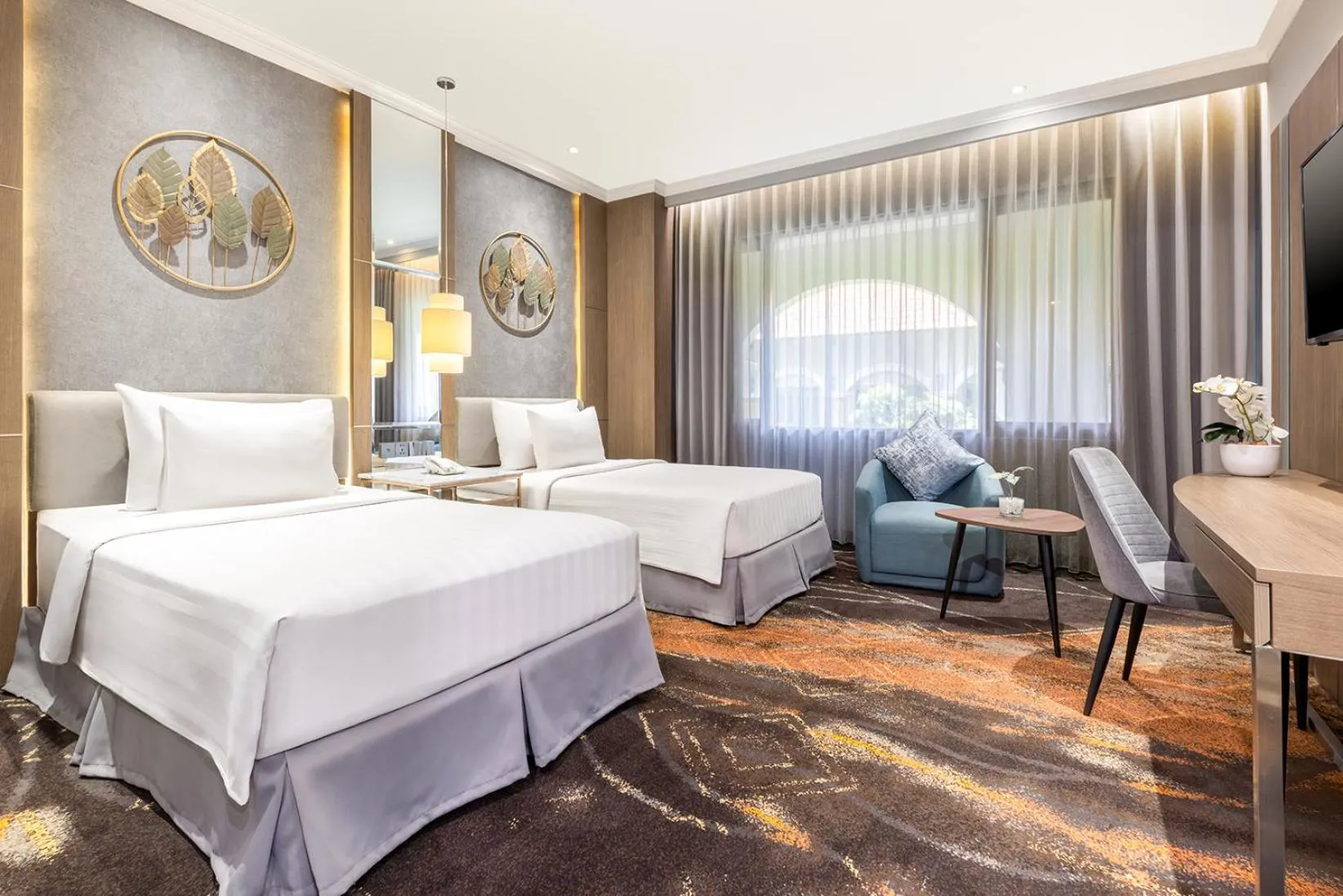 Bed in Aston Tropicana Hotel Bandung