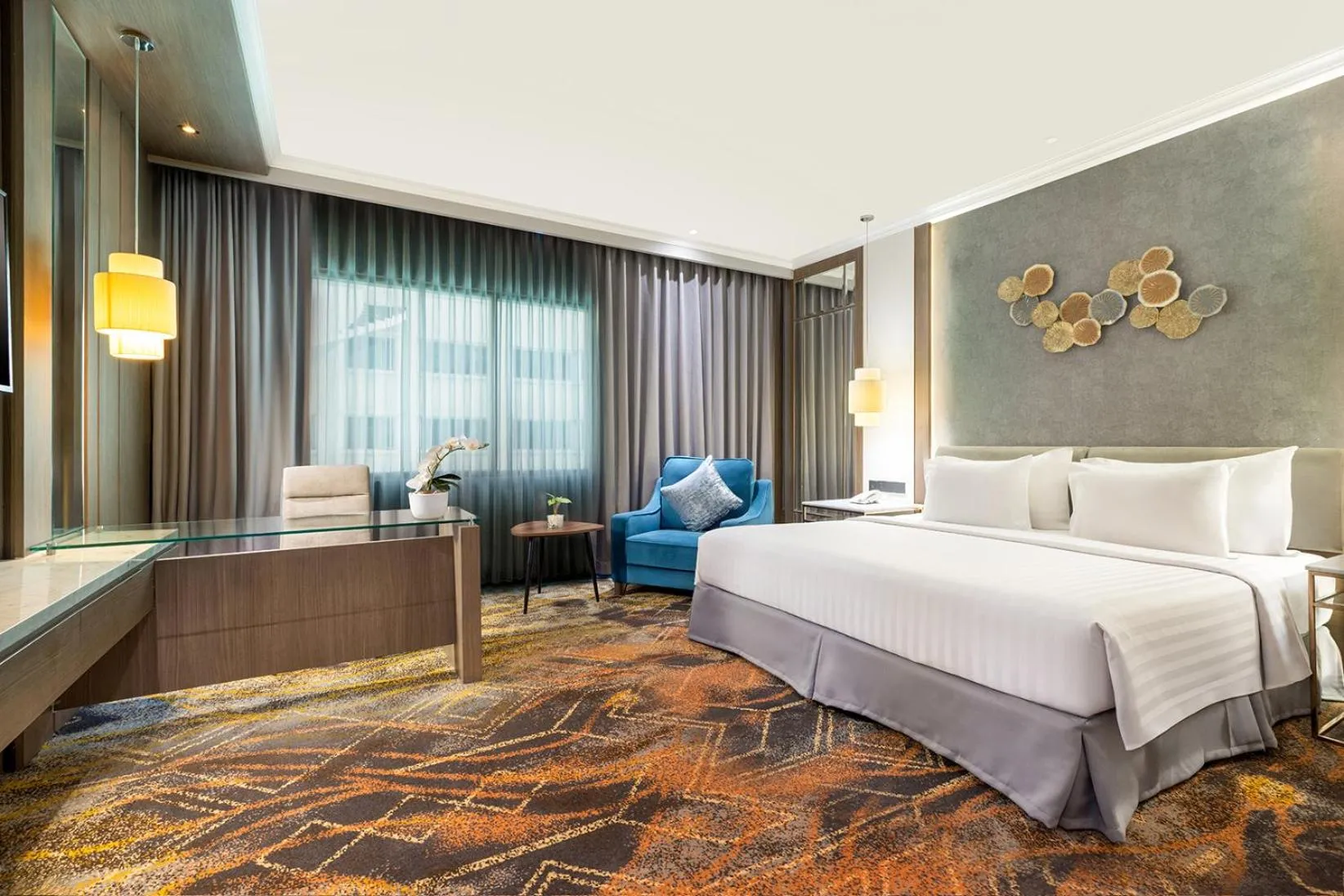 Bed in Aston Tropicana Hotel Bandung