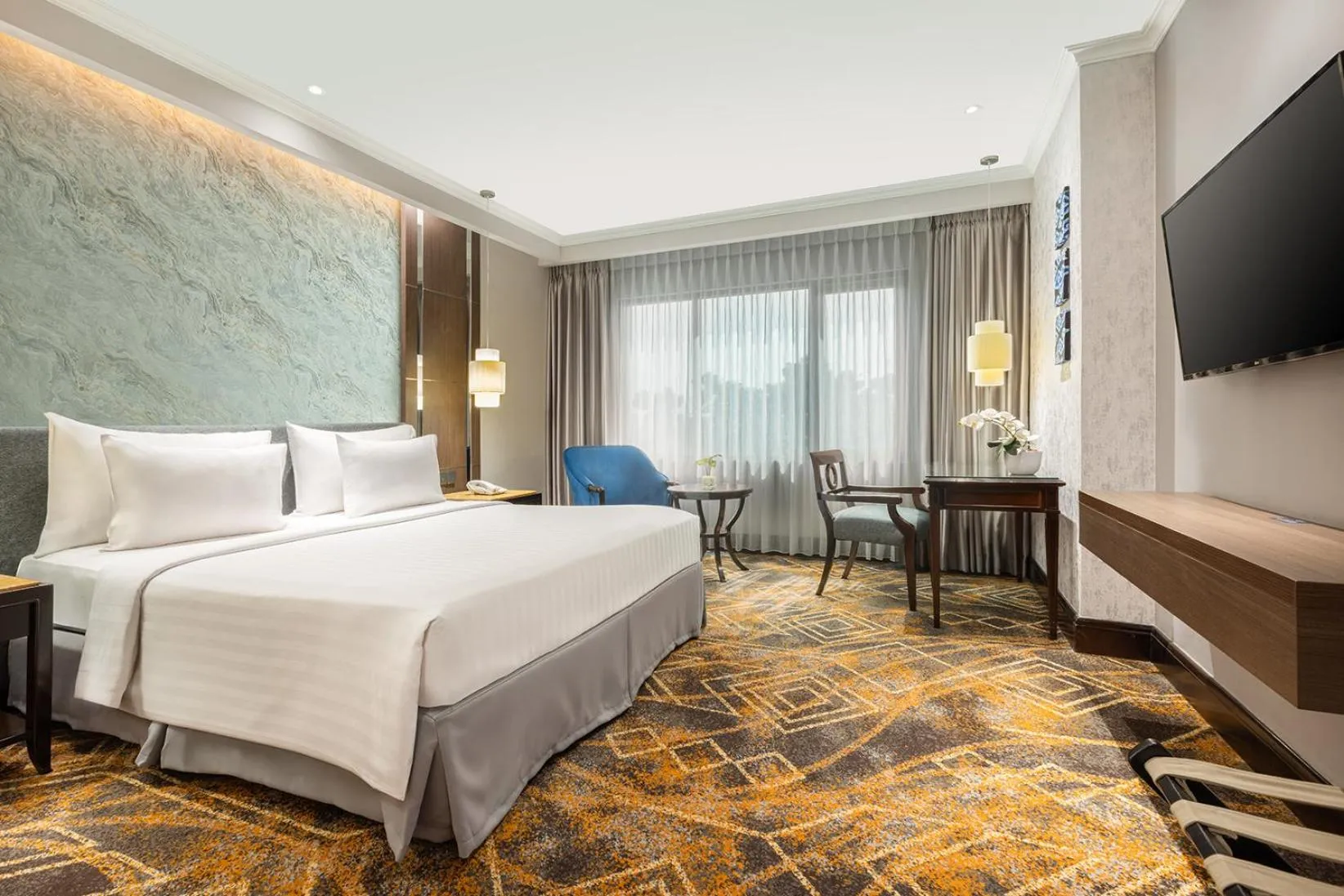 Bed in Aston Tropicana Hotel Bandung