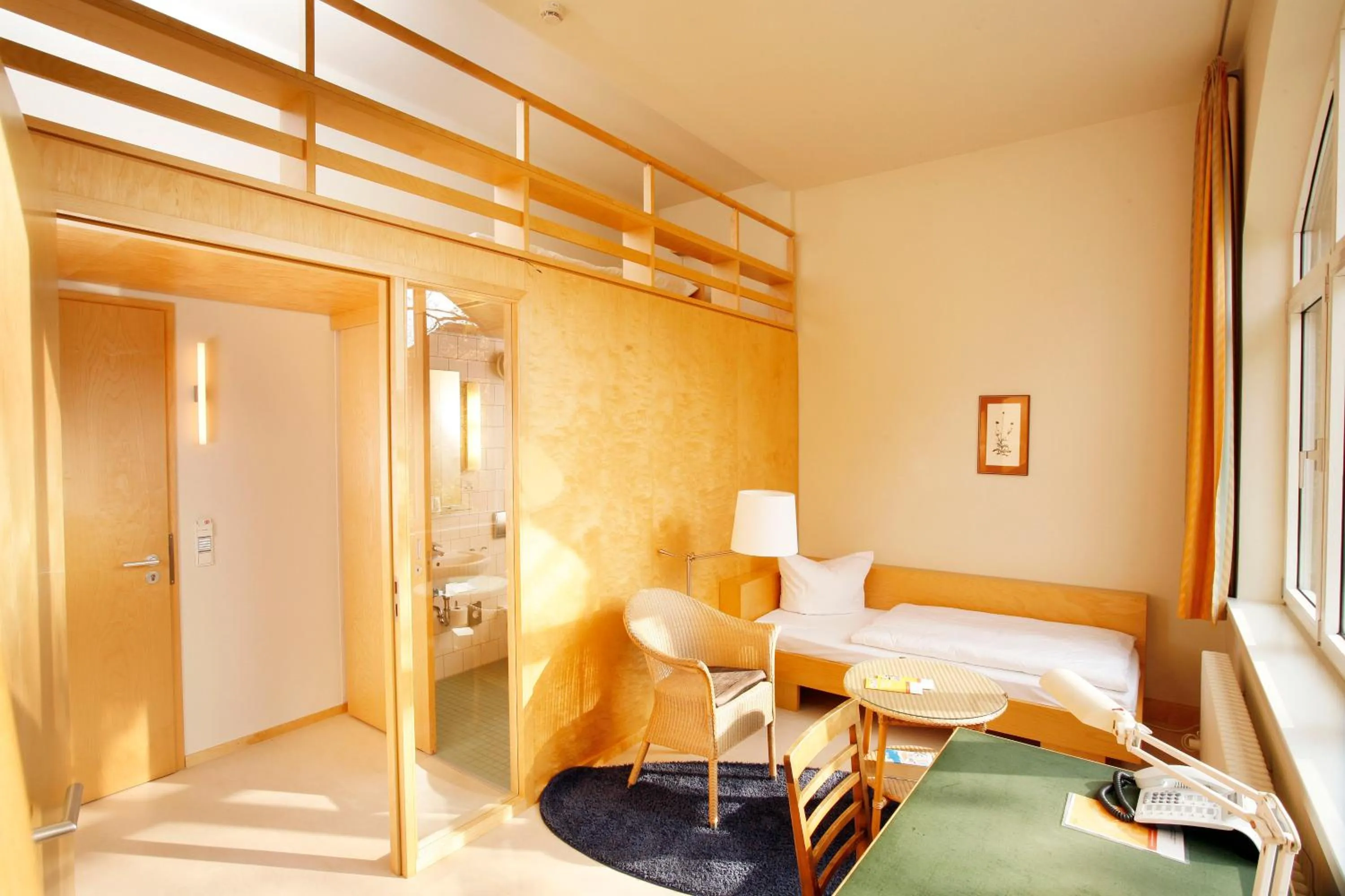 Photo of the whole room, Bed in Gäste- und Tagungshaus am Glockengarten