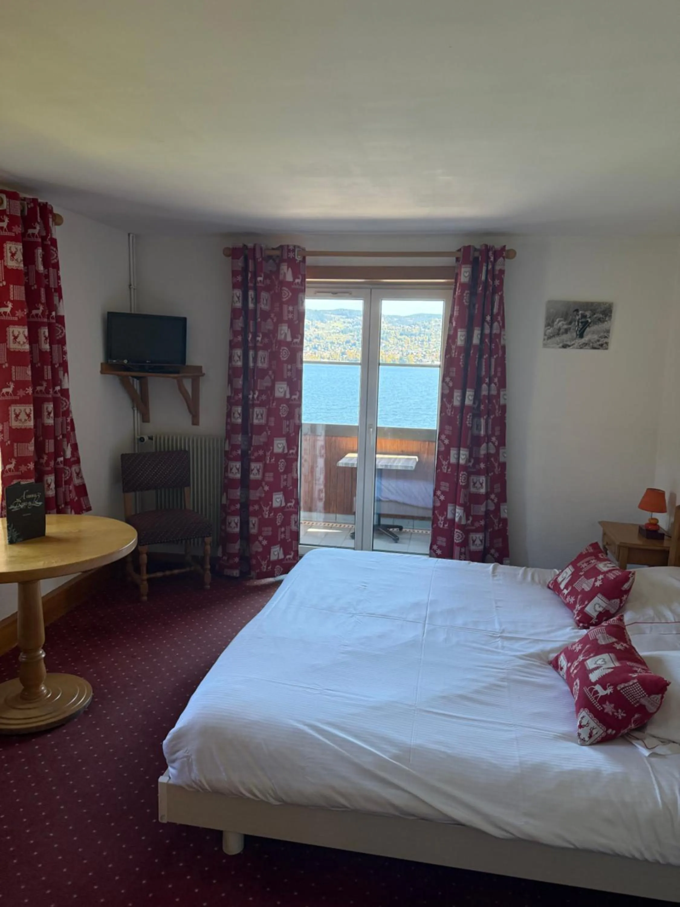 Bed in L'Auberge au Bord du Lac