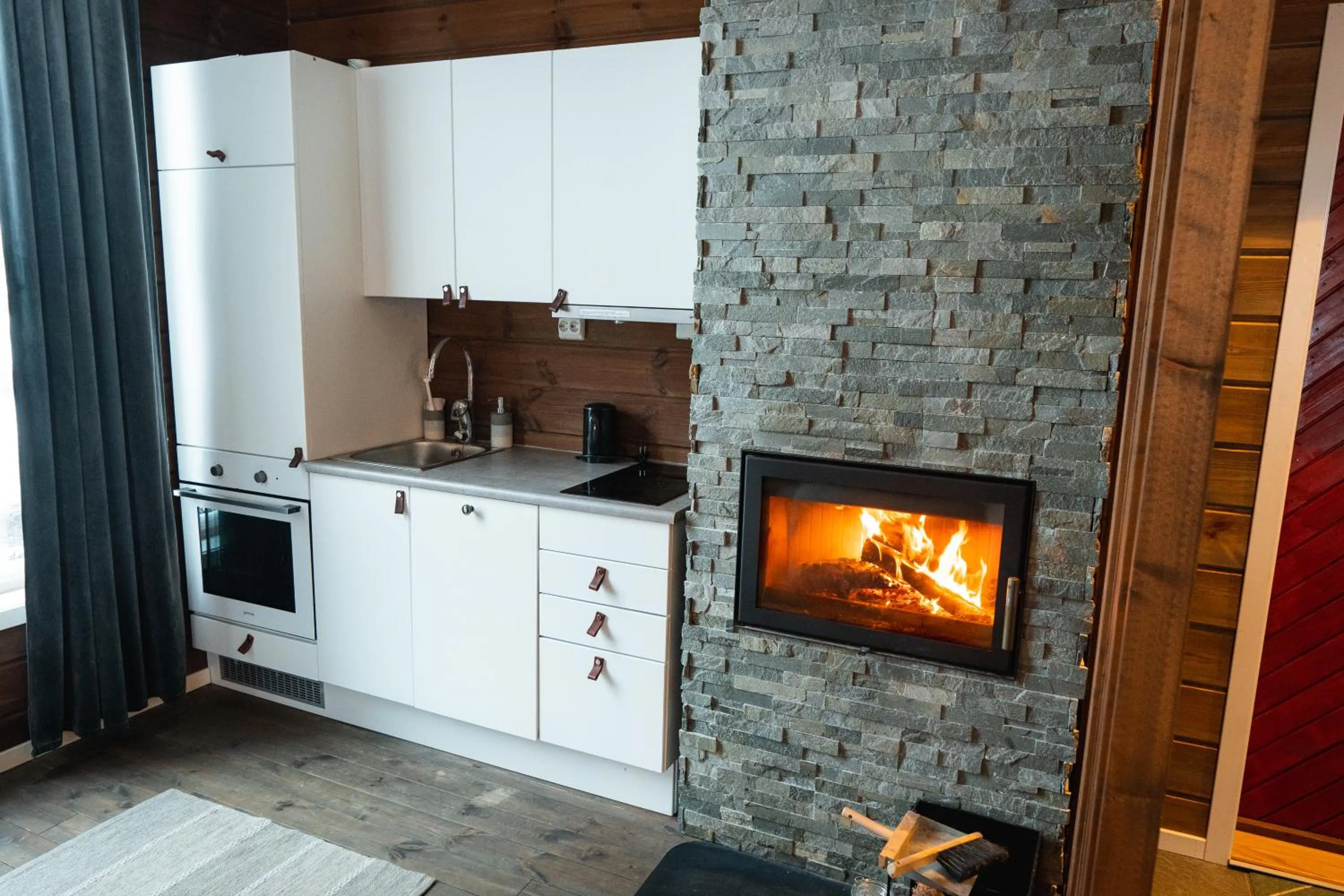 fireplace in Bjørnfjell Mountain Lodge