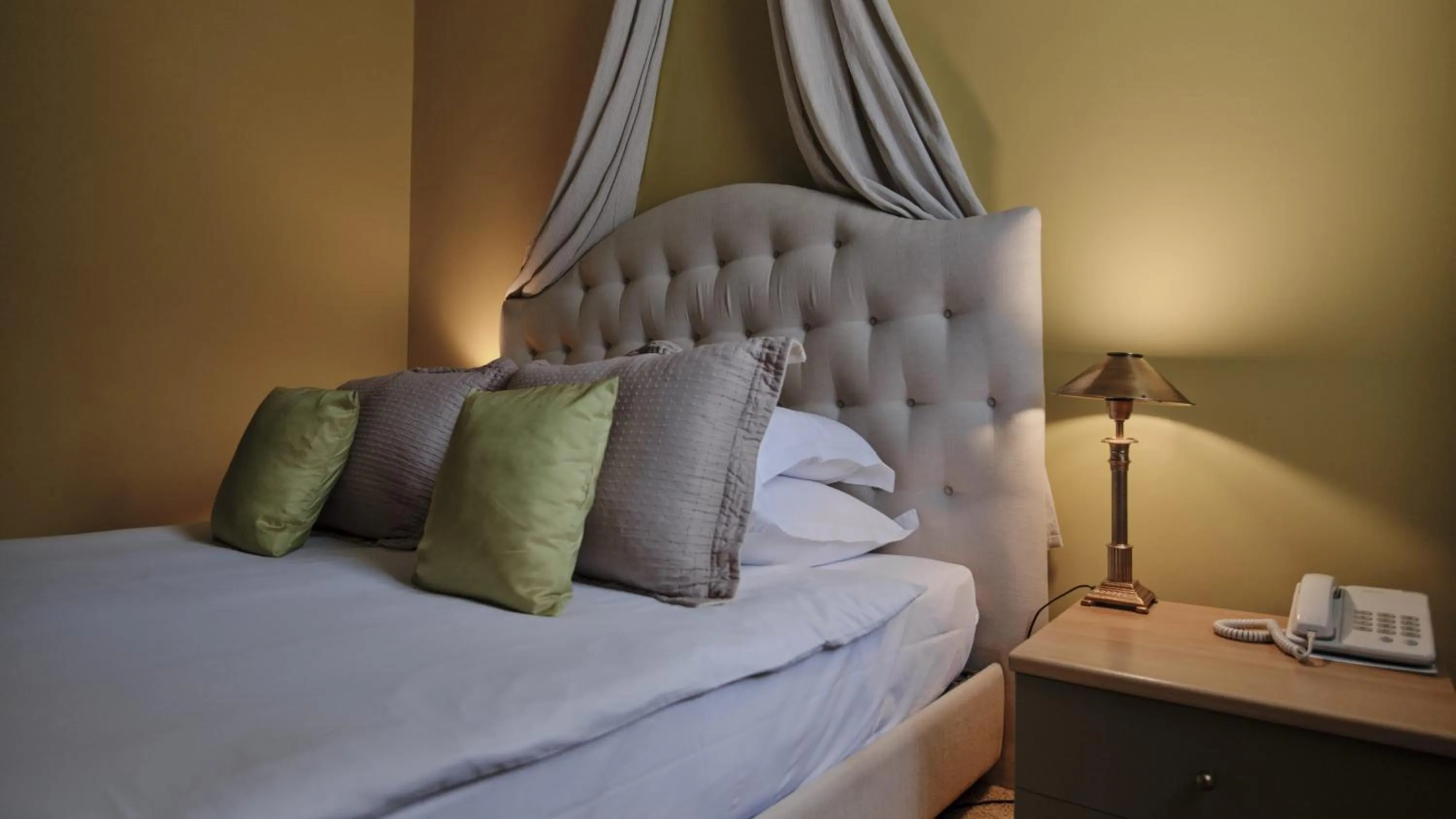 Bed in Vozdvyzhensky Boutique Hotel