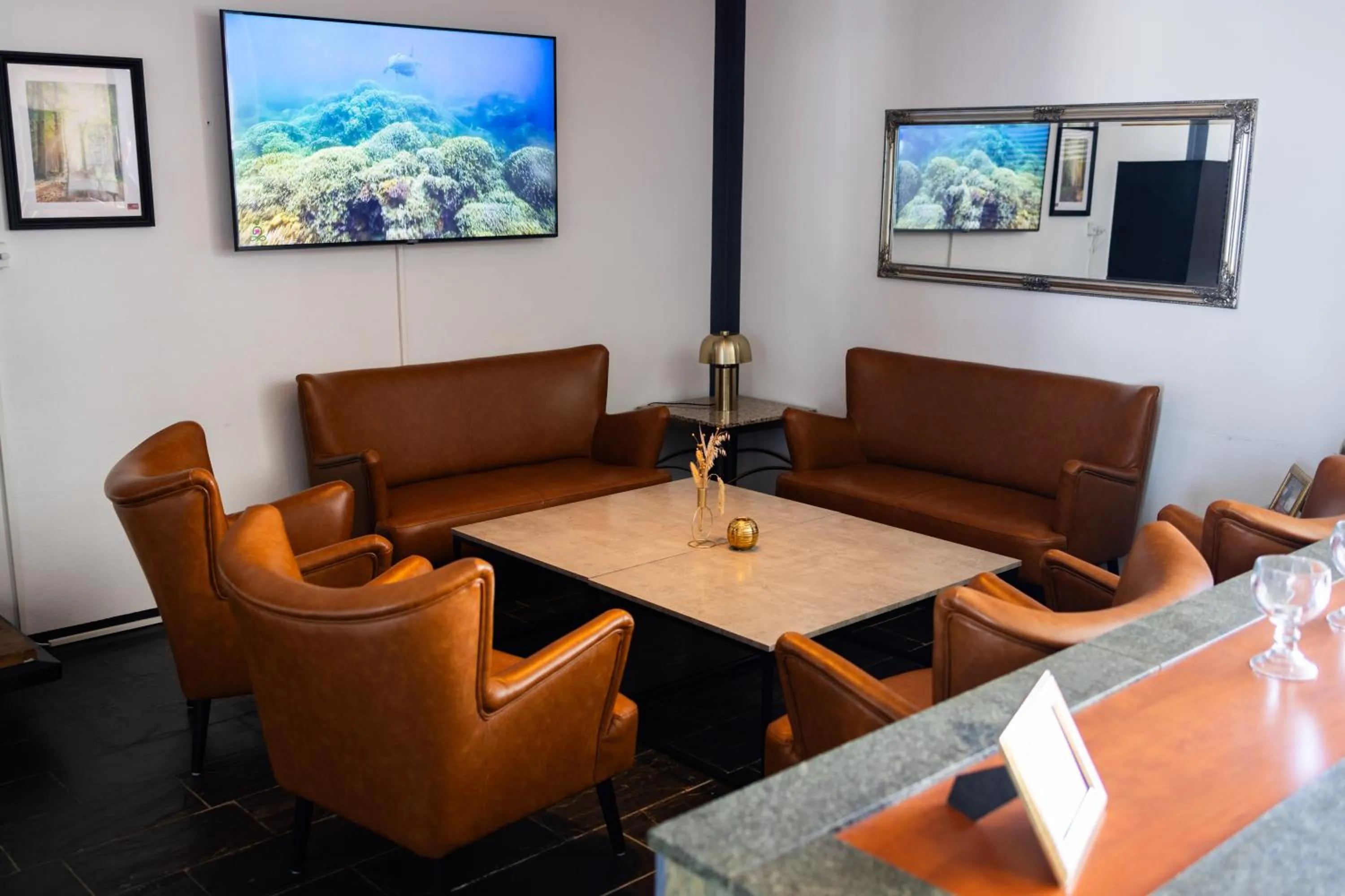 Communal lounge/ TV room in Milling Hotel Søpark