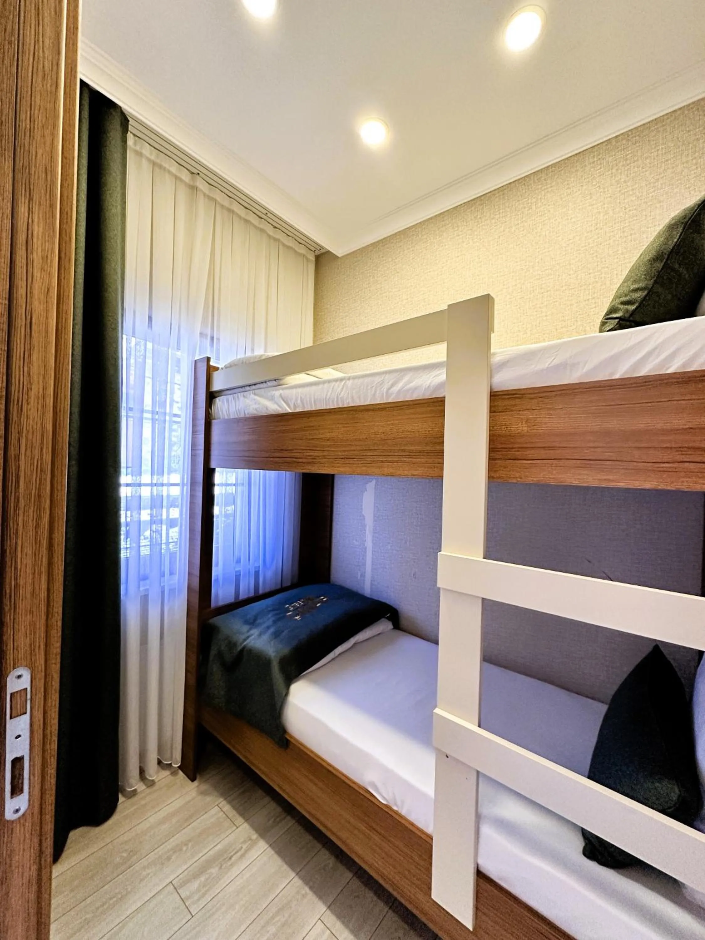 Bed in Green Cinar Apart