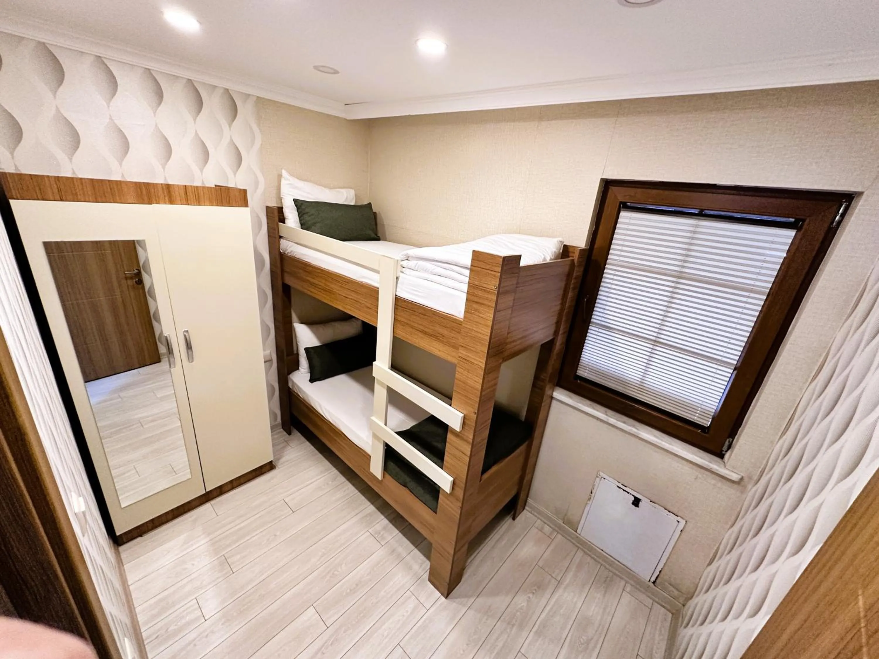 Bed in Green Cinar Apart