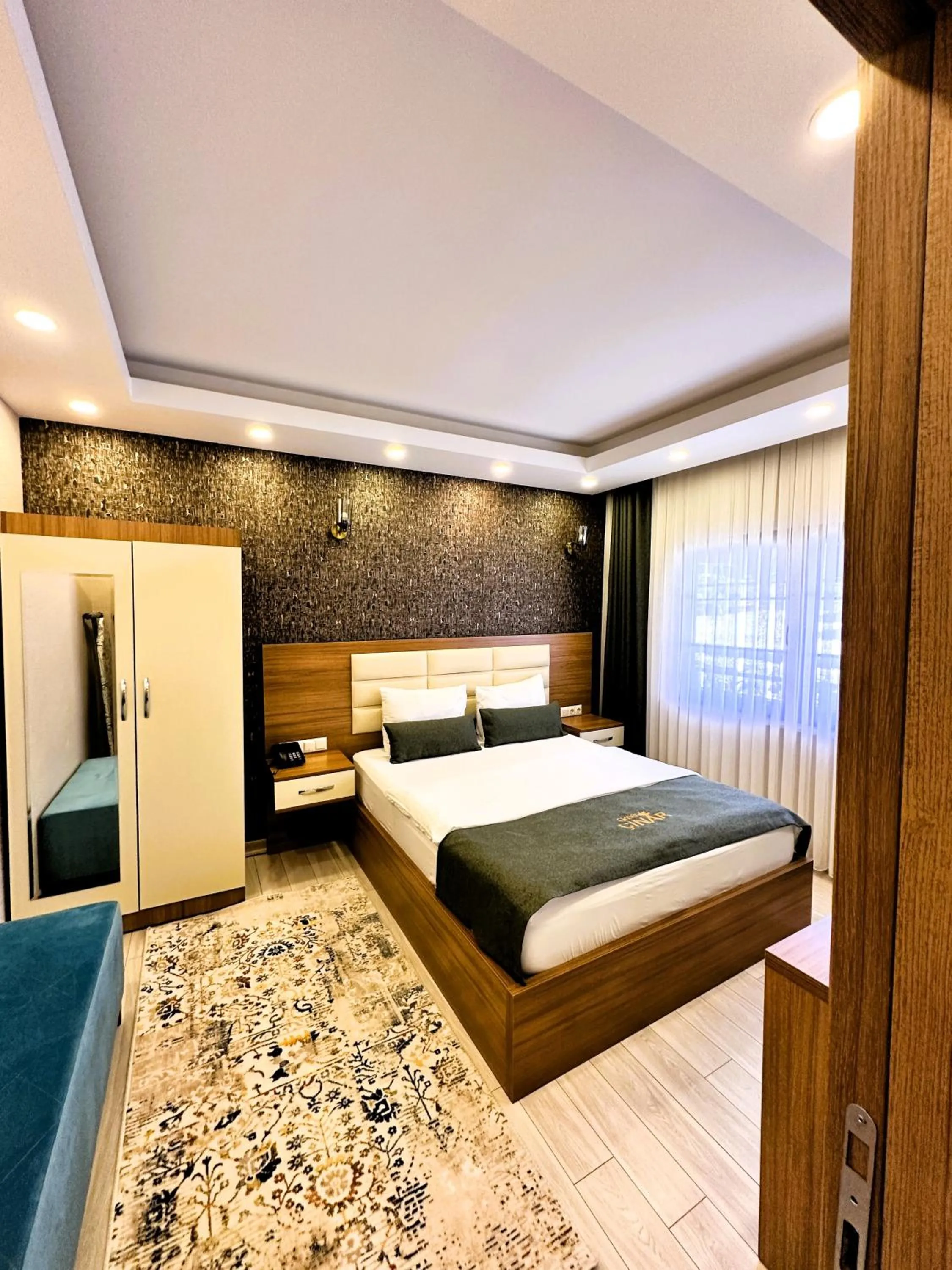 Bed in Green Cinar Apart