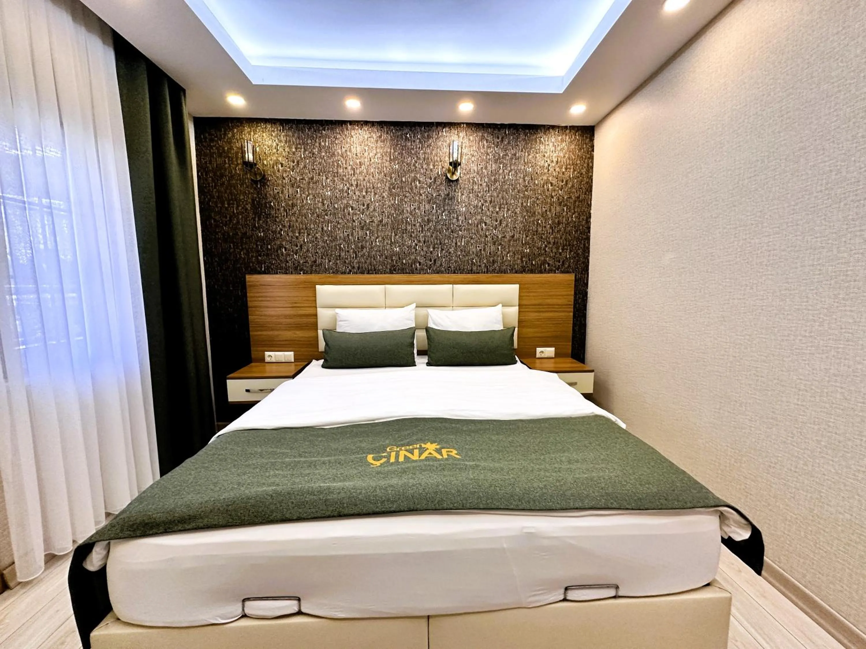 Bed in Green Cinar Apart