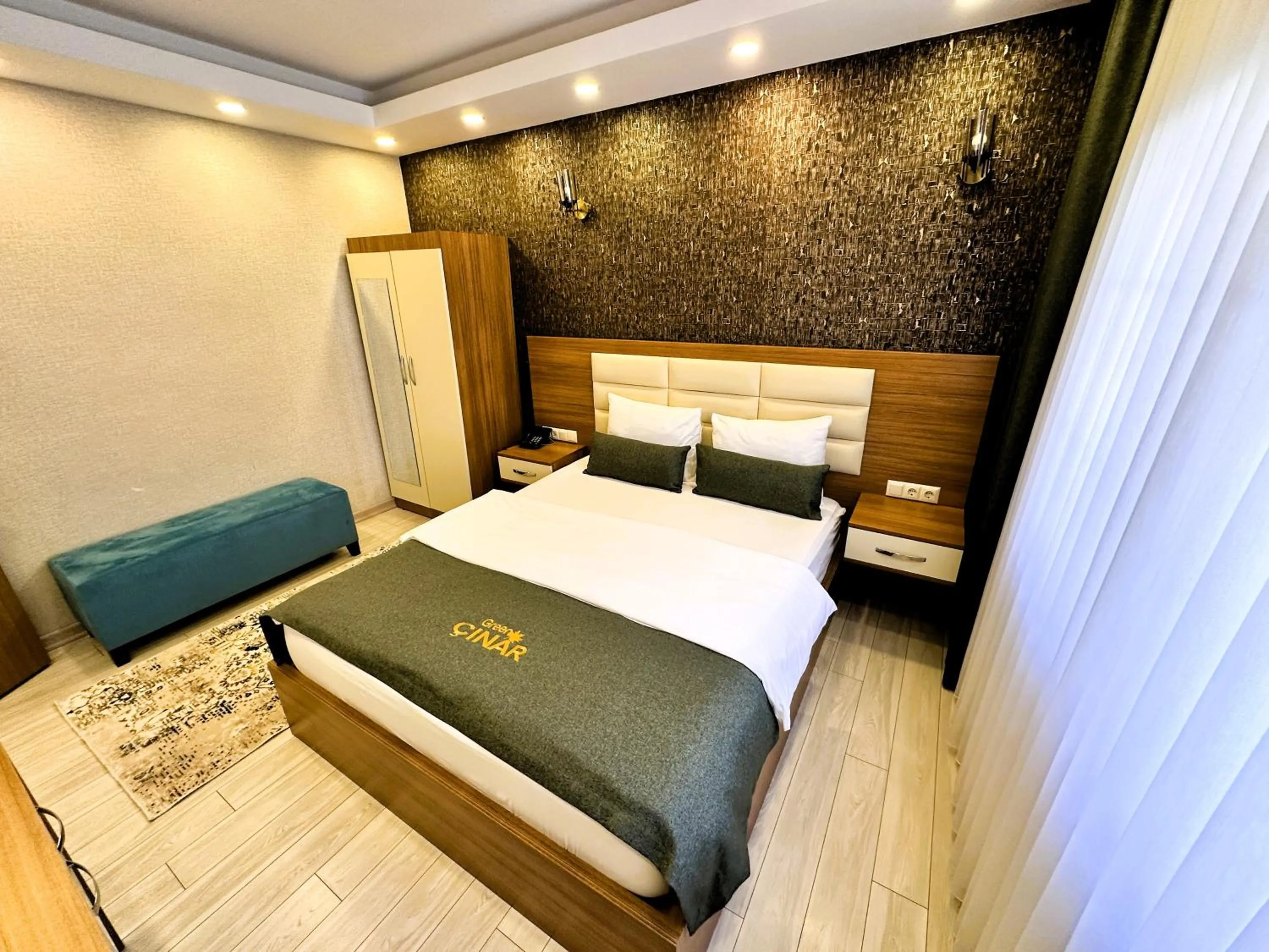 Bed in Green Cinar Apart