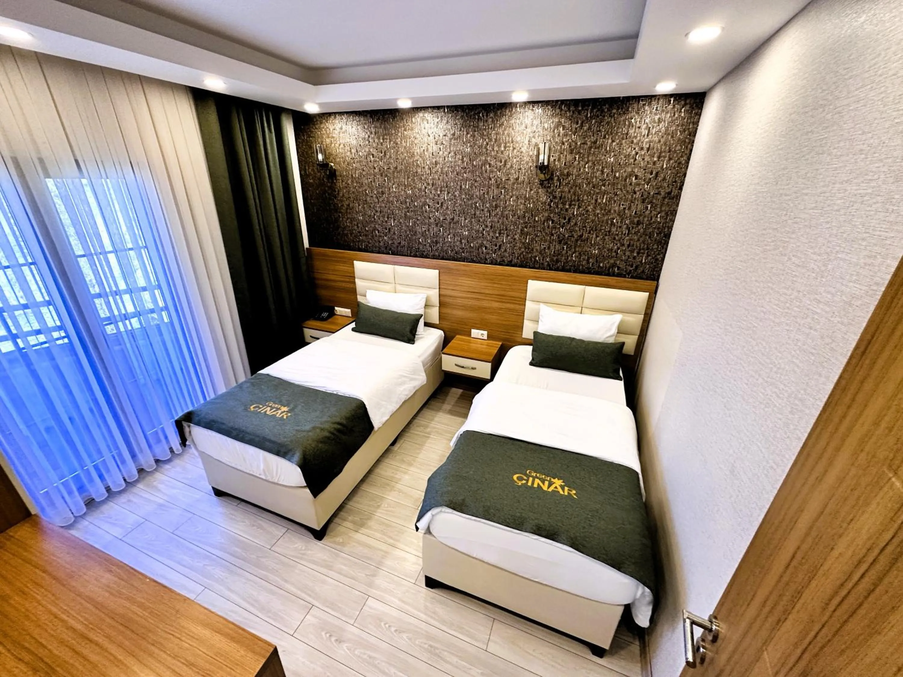 Bed in Green Cinar Apart