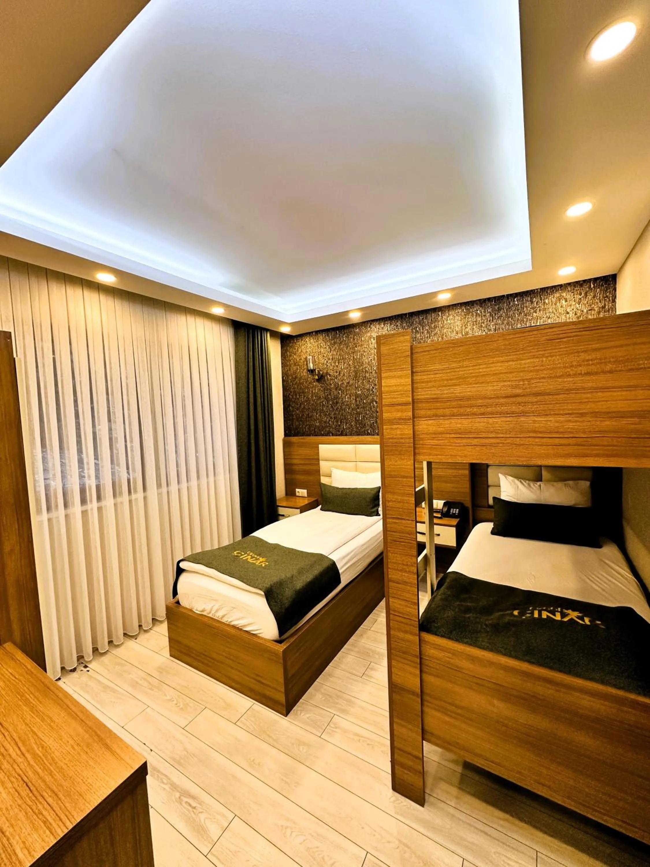 Bed in Green Cinar Apart