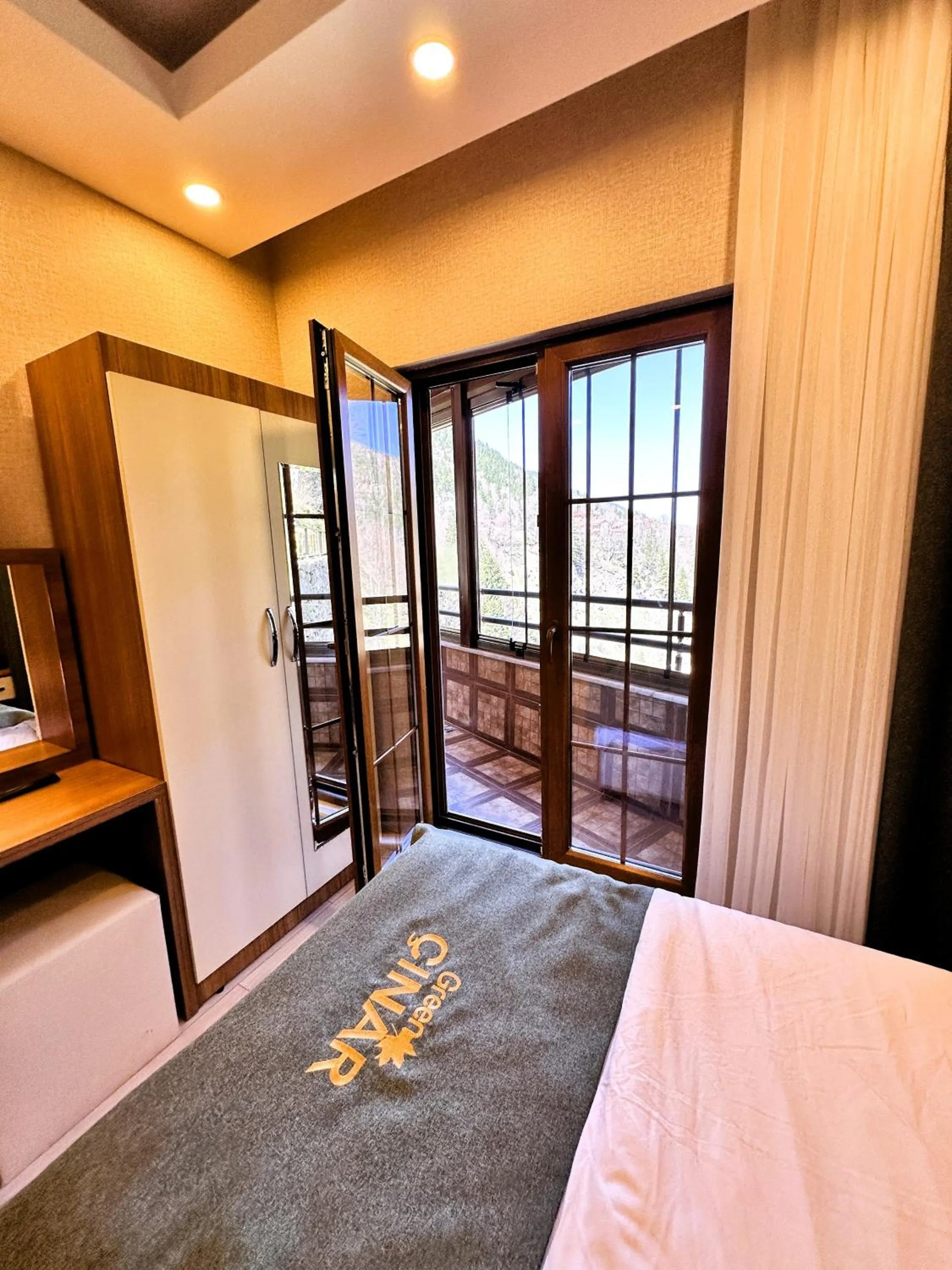 Bed in Green Cinar Apart