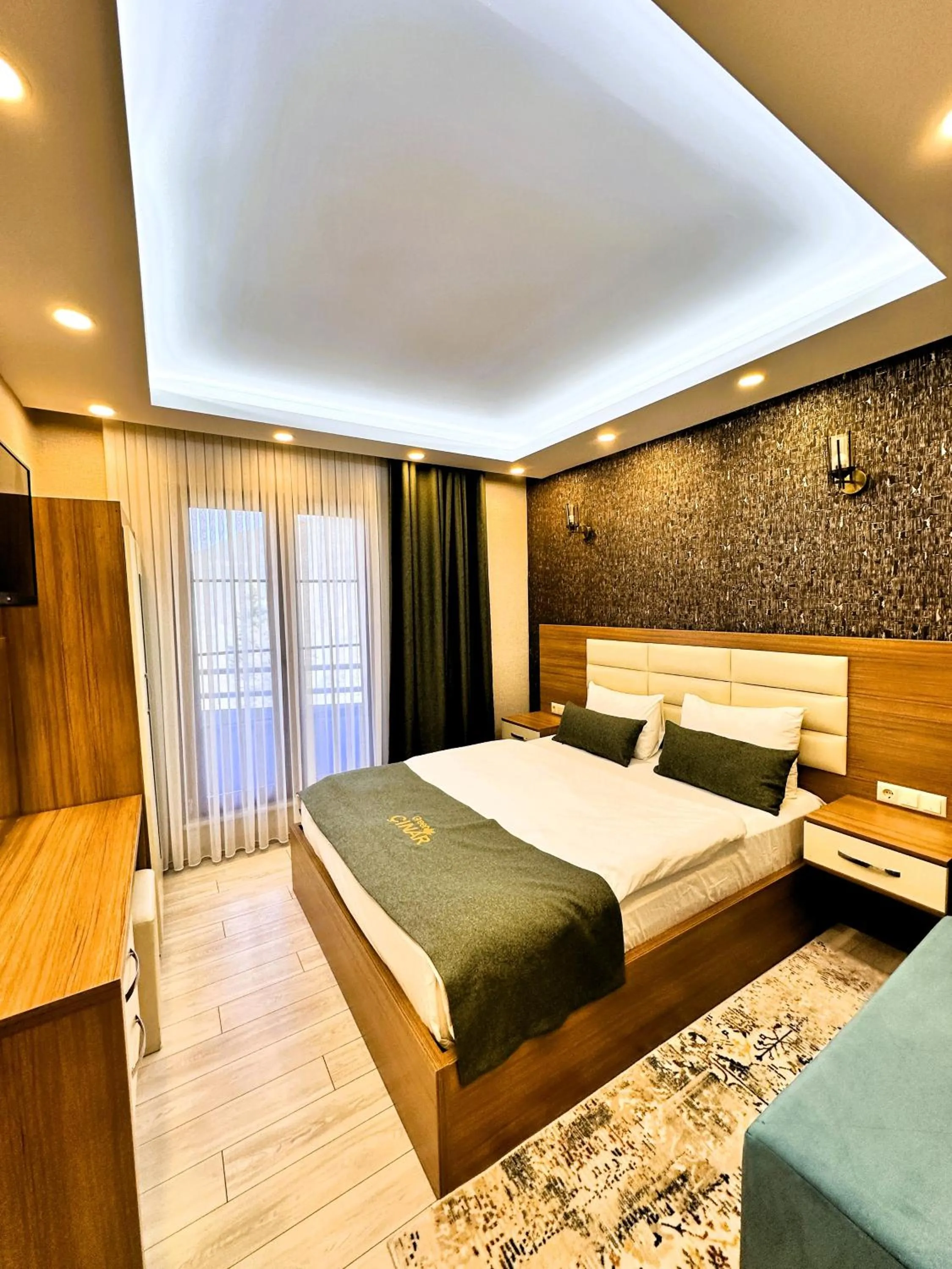 Bed in Green Cinar Apart