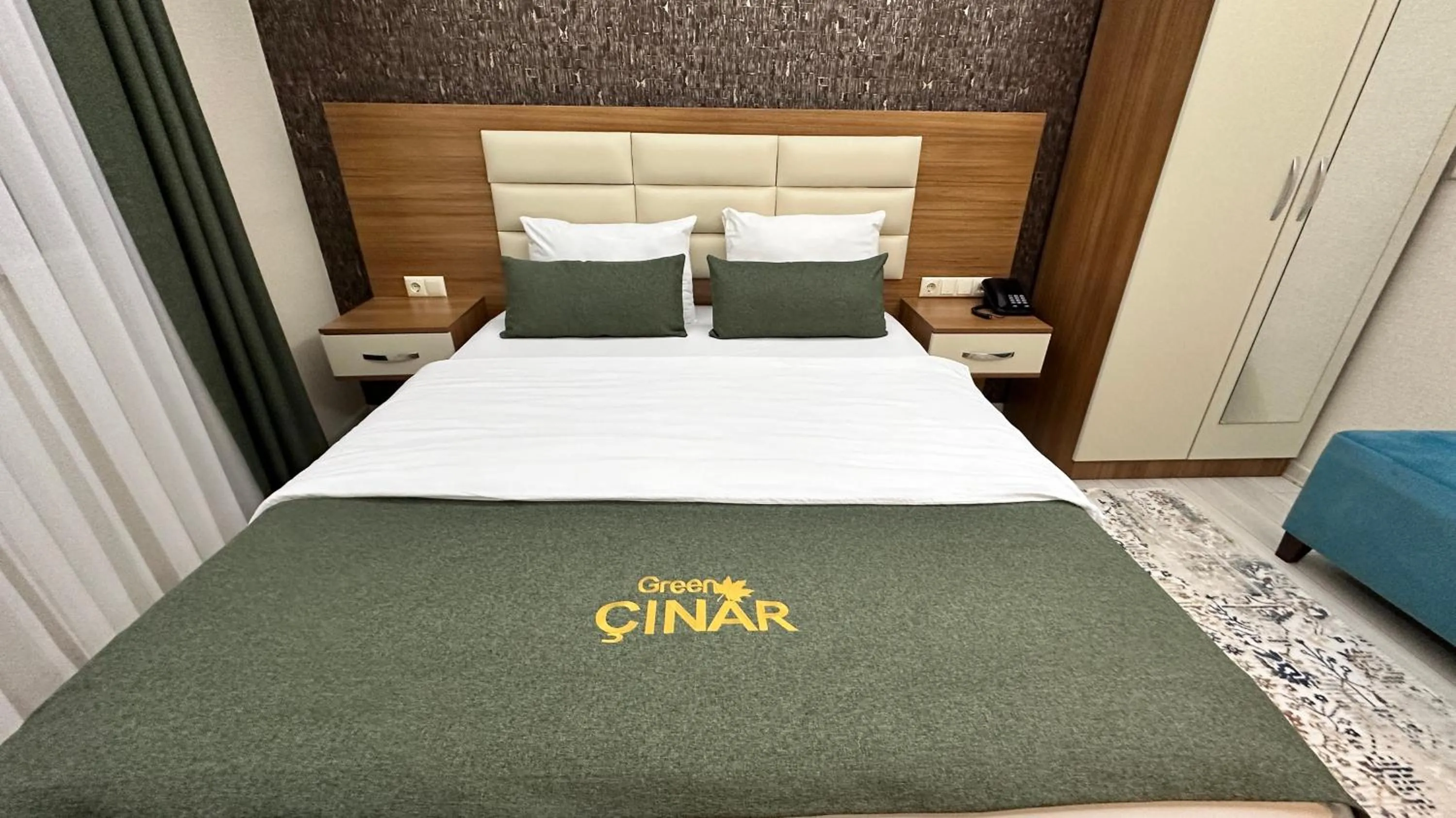 Bed in Green Cinar Apart