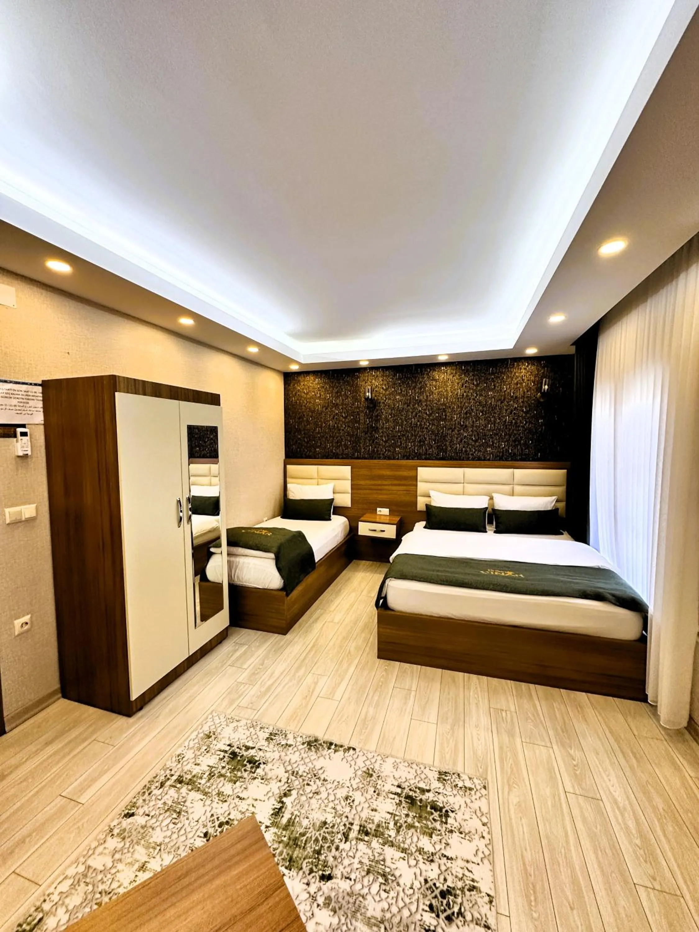 Bed in Green Cinar Apart