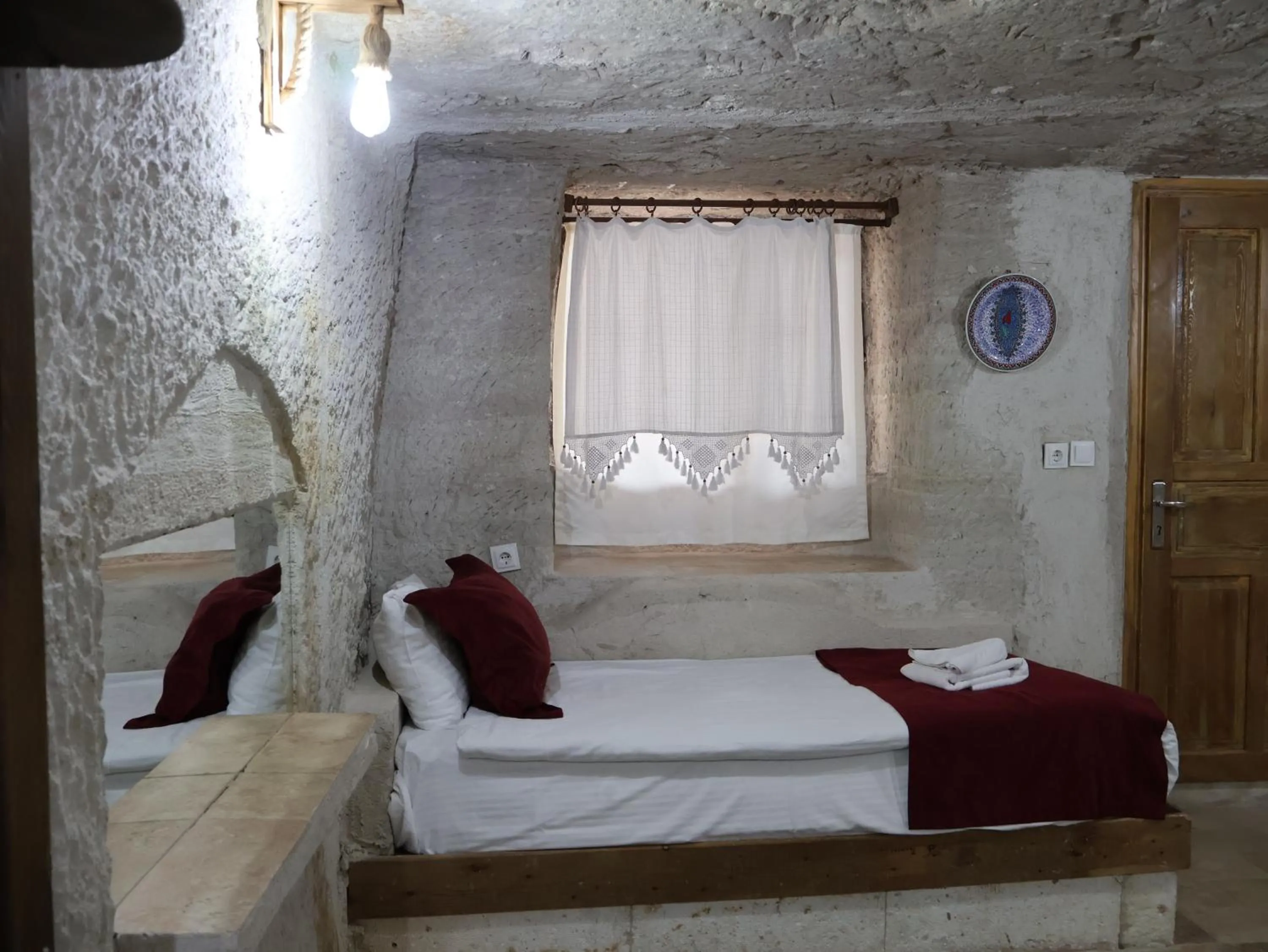 Bed in Seven Rock Cave Hotel