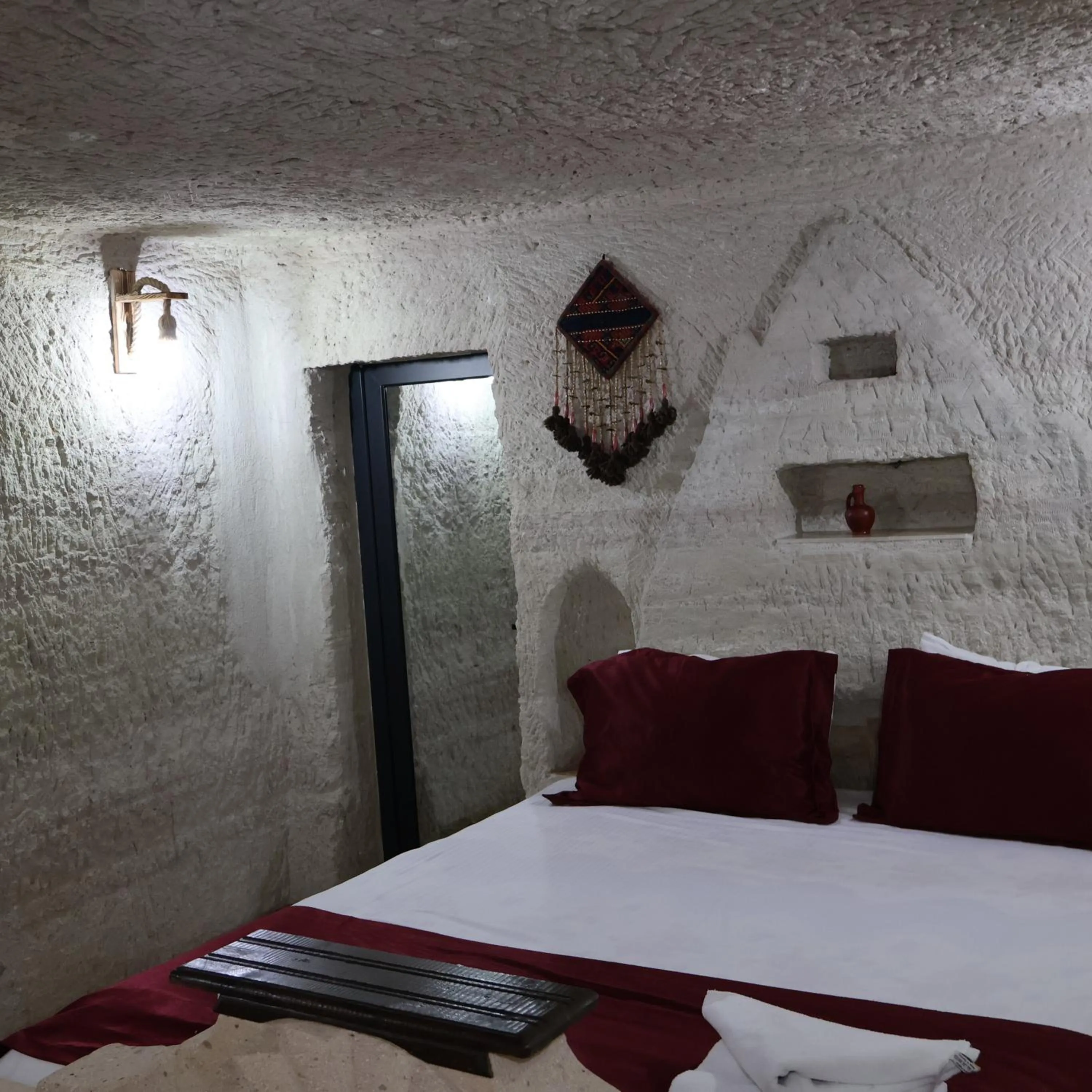 Bed in Seven Rock Cave Hotel