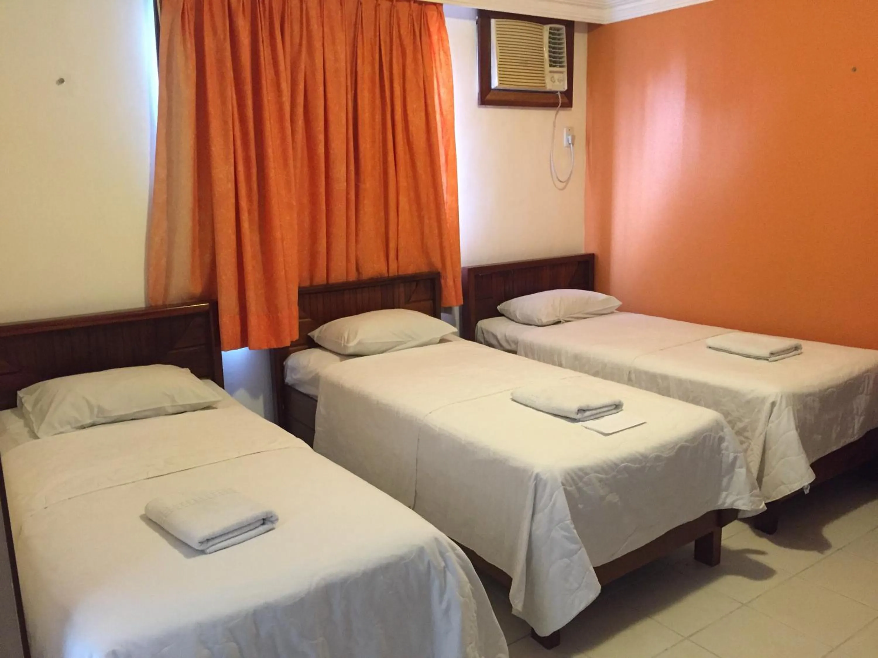 Bed in Machado´s Plaza Hotel