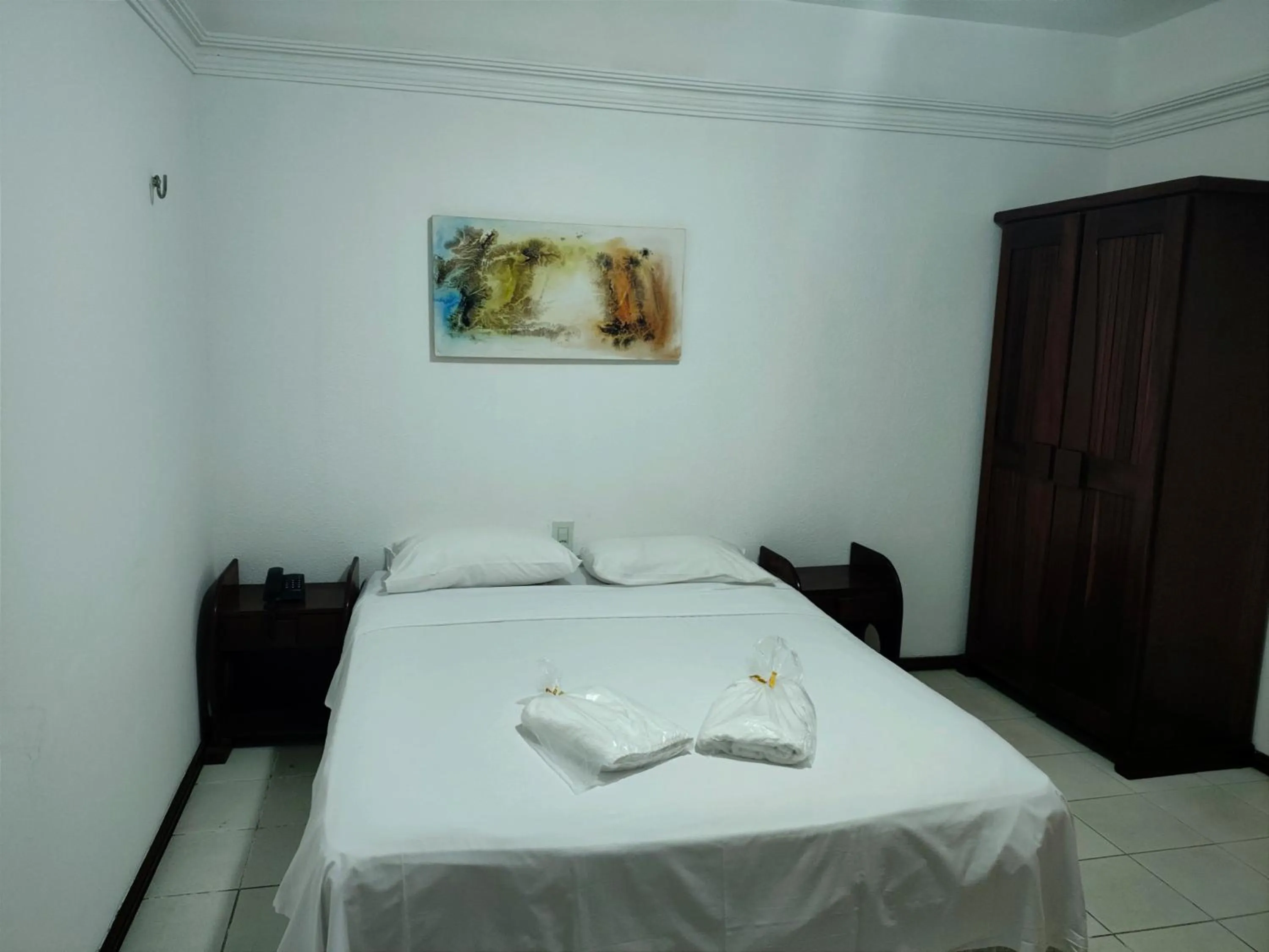 Bed in Machado´s Plaza Hotel