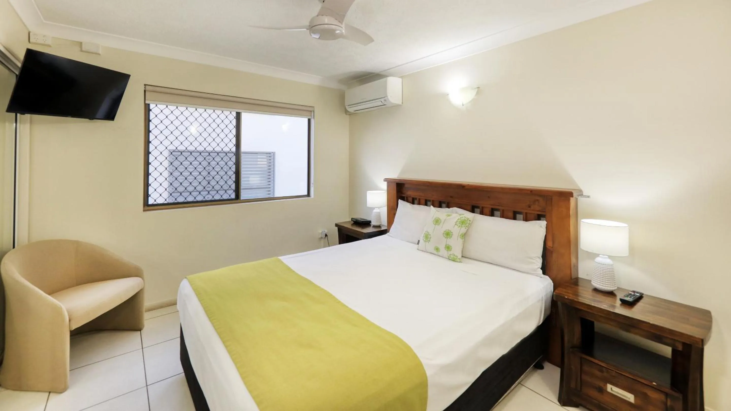 Bed in L'Amor Holiday Apartments