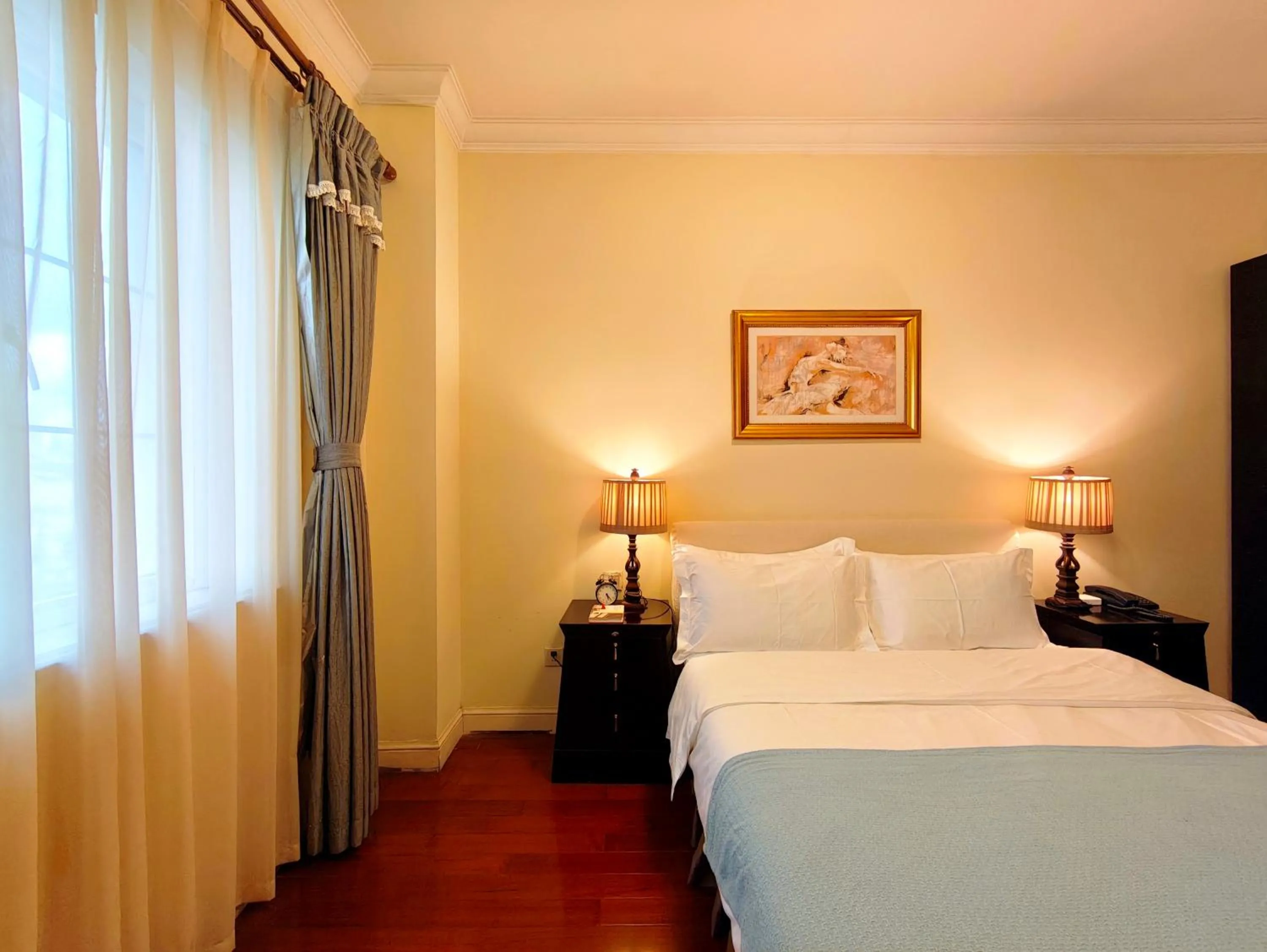 Bed in Ladoll Service Apartments