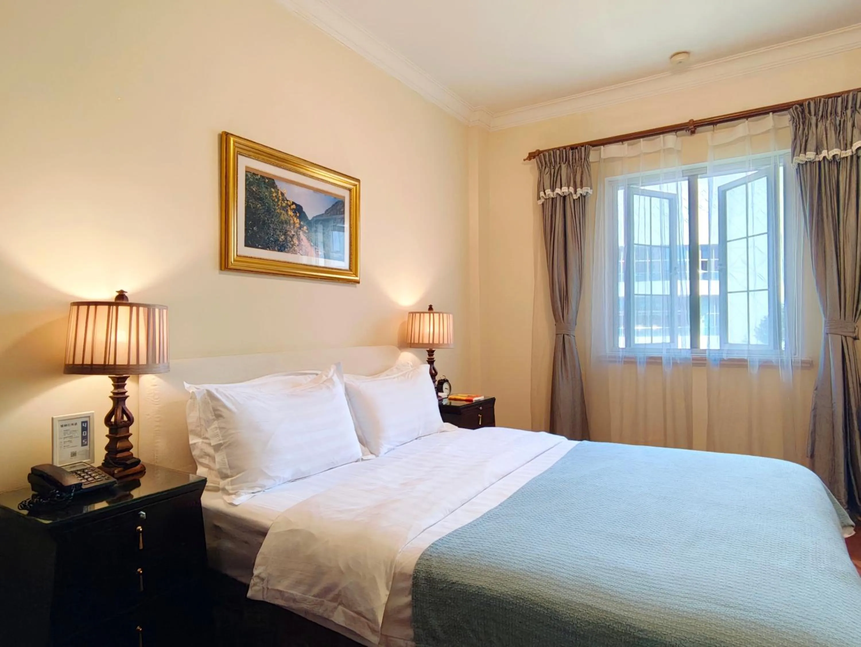 Bed in Ladoll Service Apartments