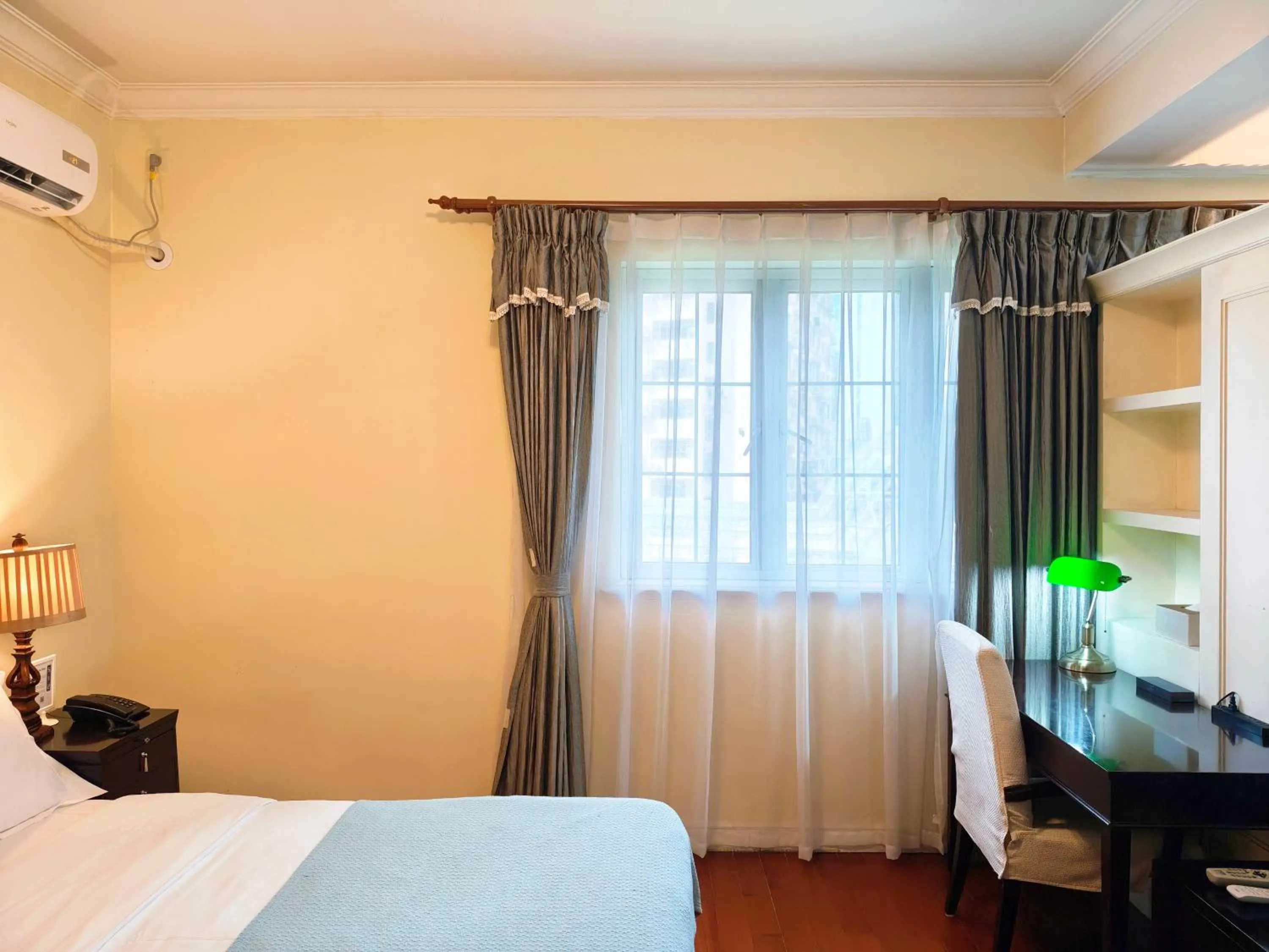 Bed in Ladoll Service Apartments