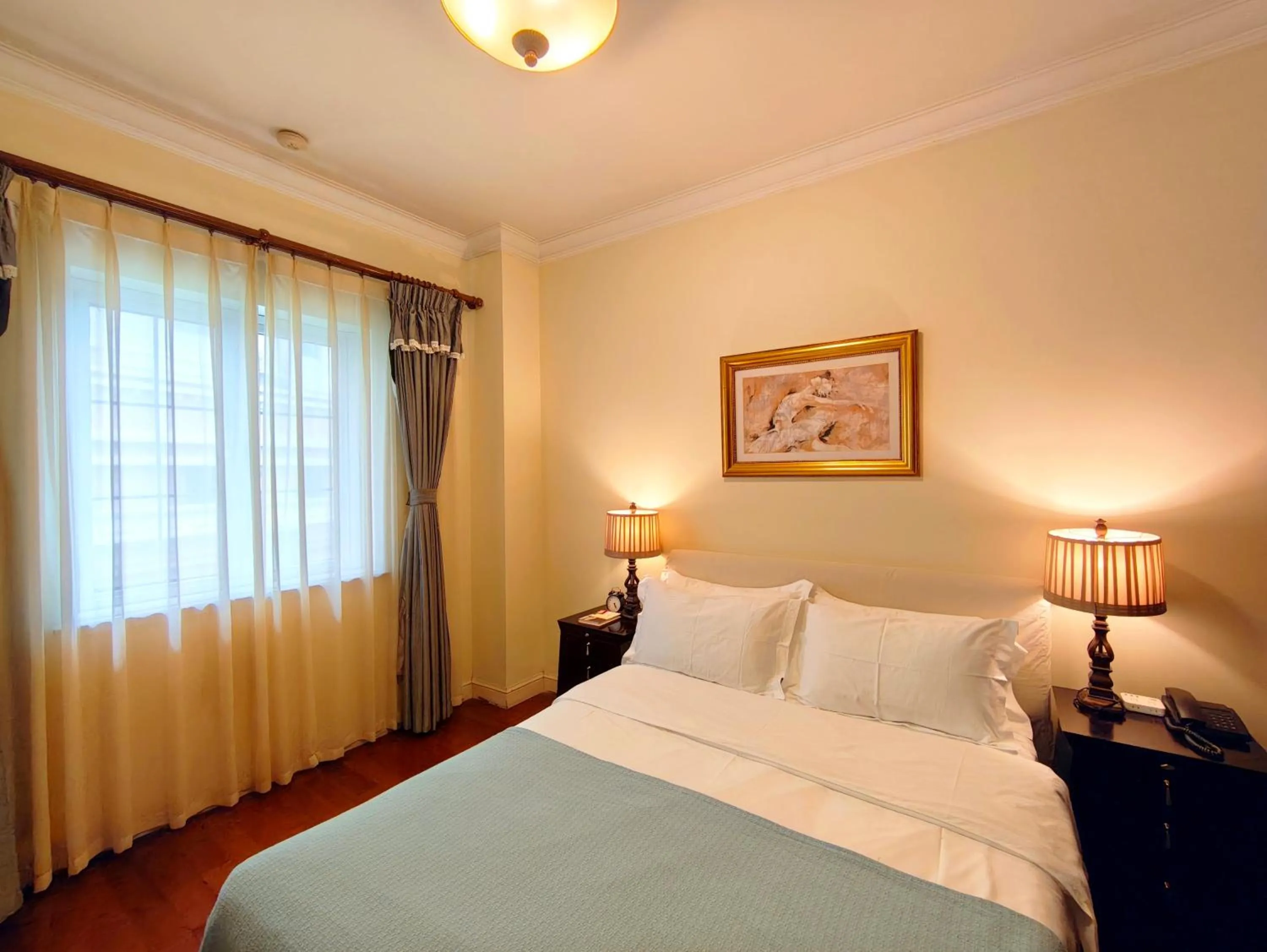 Bed in Ladoll Service Apartments