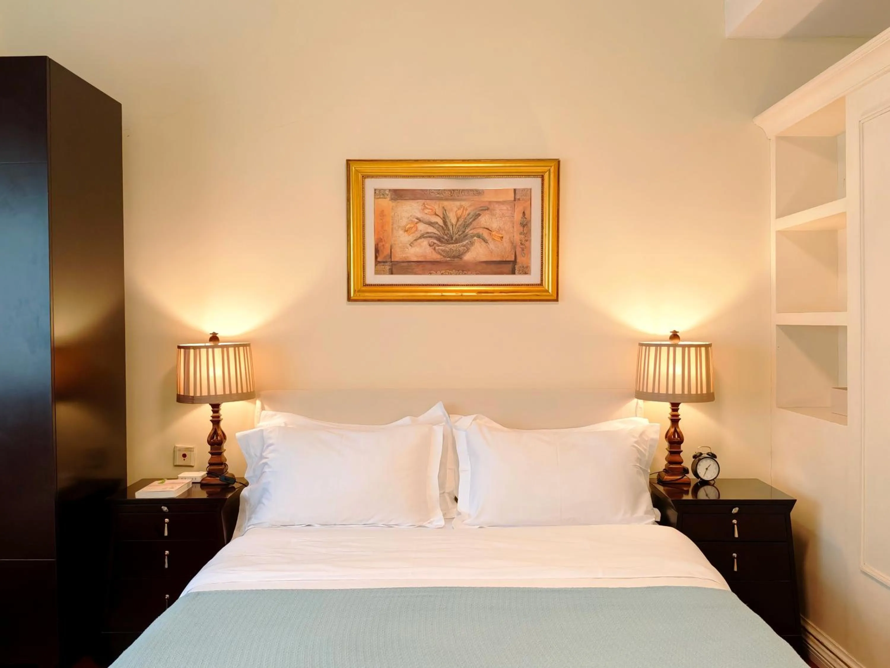 Bed in Ladoll Service Apartments