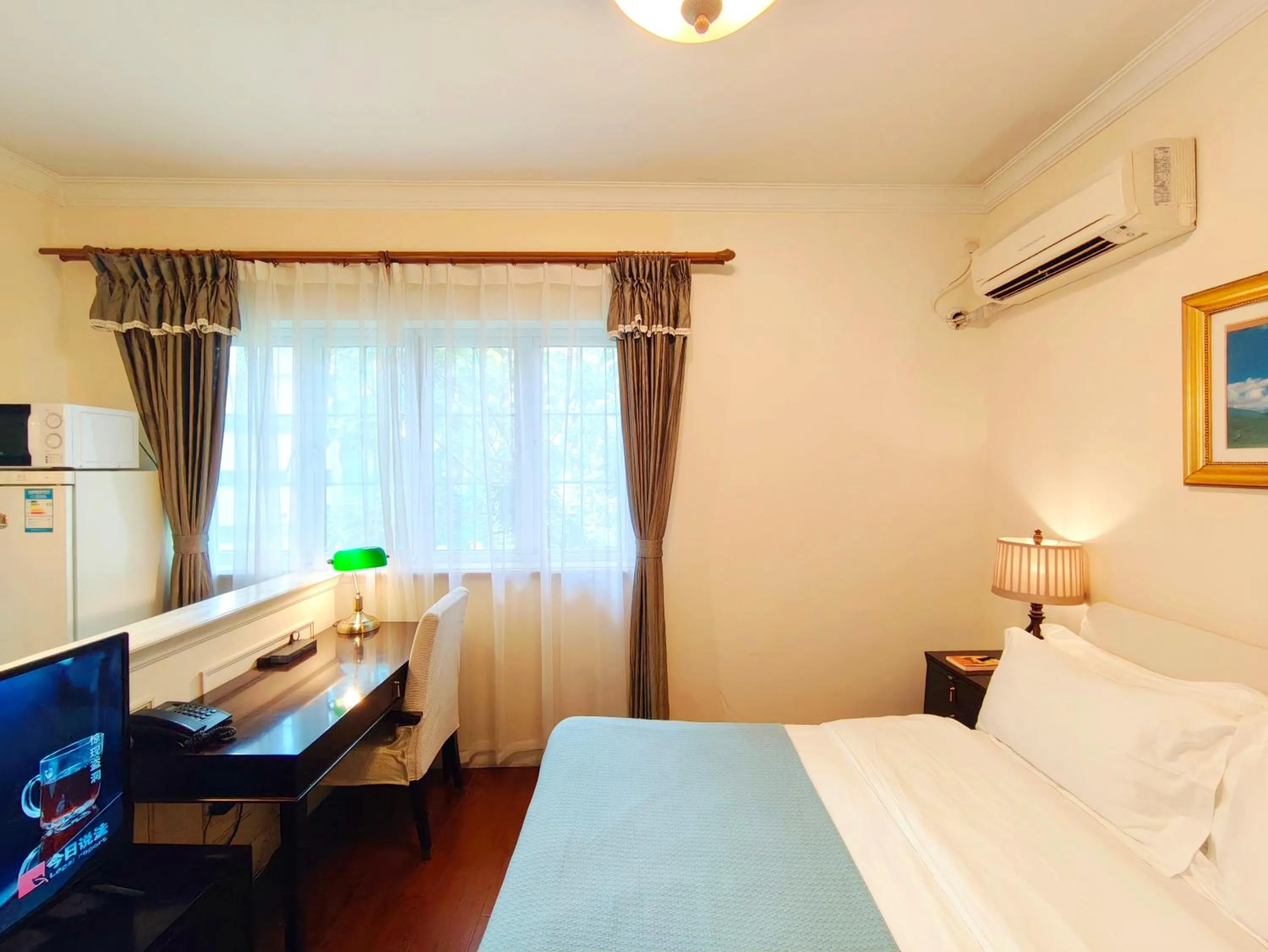 Bed in Ladoll Service Apartments