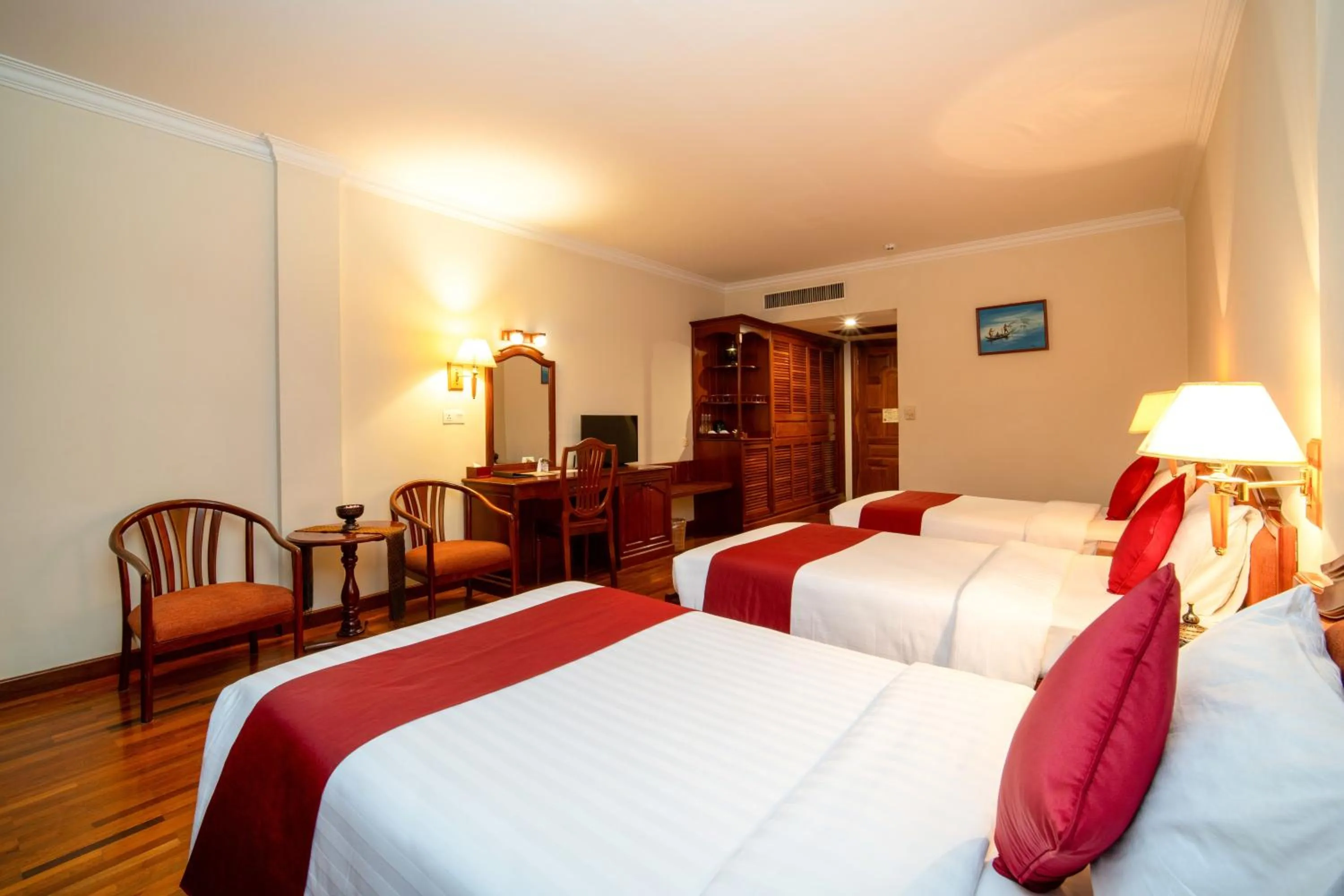 Bed in Khemara Angkor Hotel & Spa