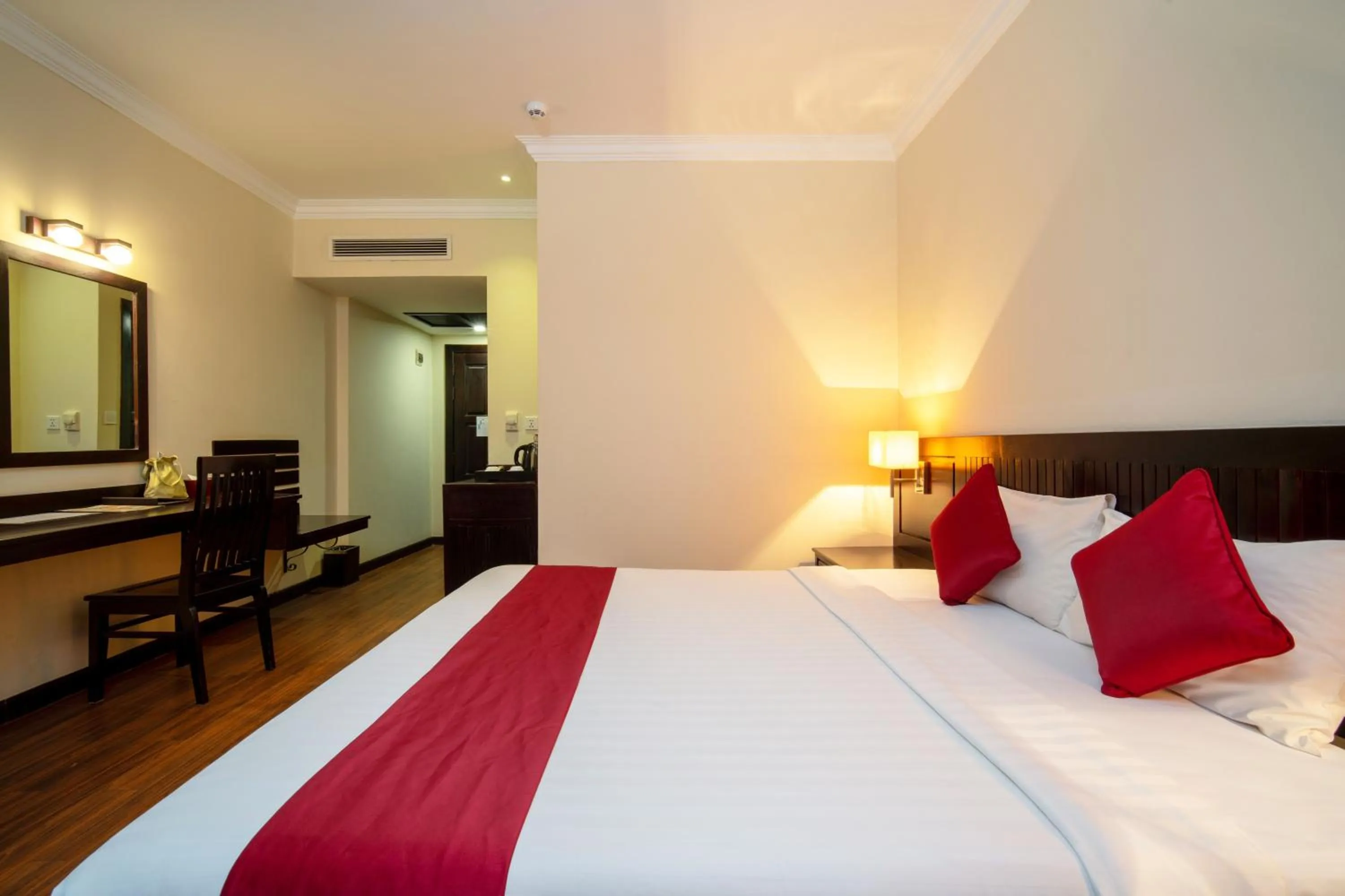 Bed in Khemara Angkor Hotel & Spa