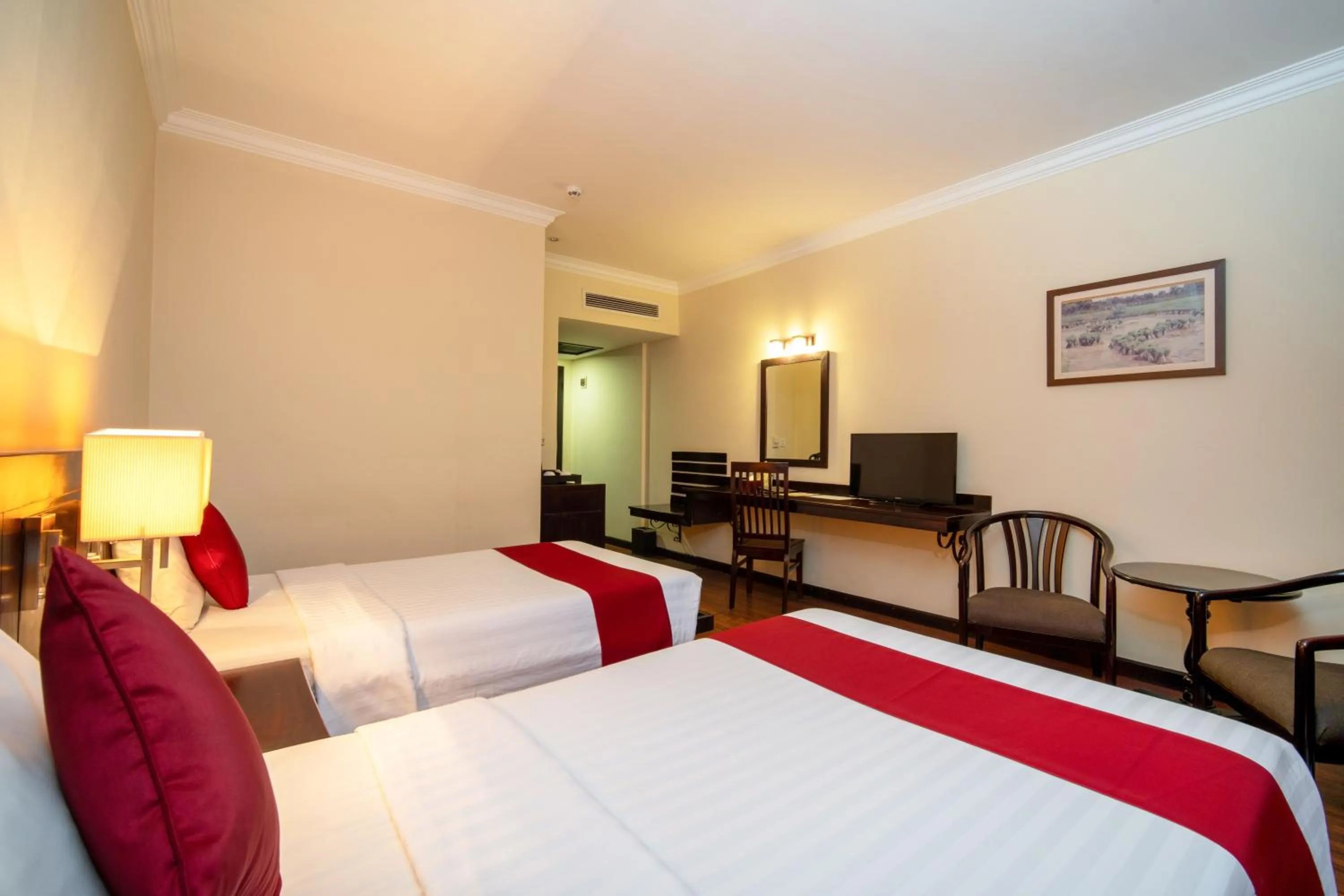 Communal lounge/ TV room, Bed in Khemara Angkor Hotel & Spa