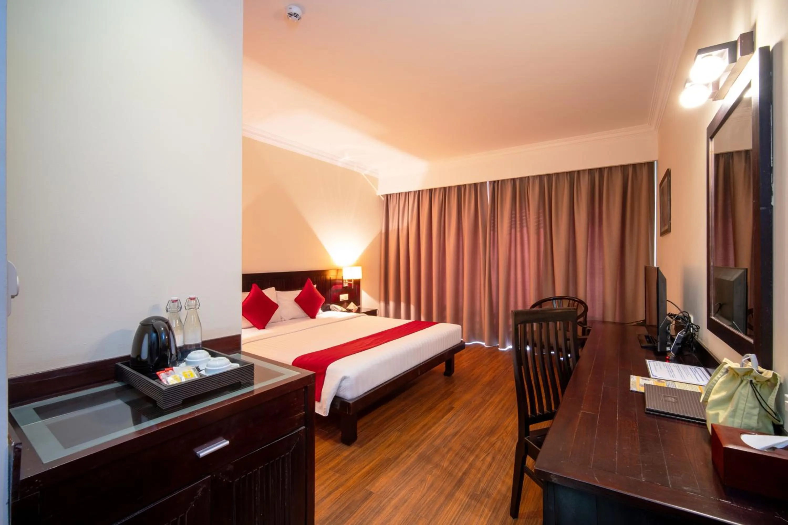 Bed in Khemara Angkor Hotel & Spa