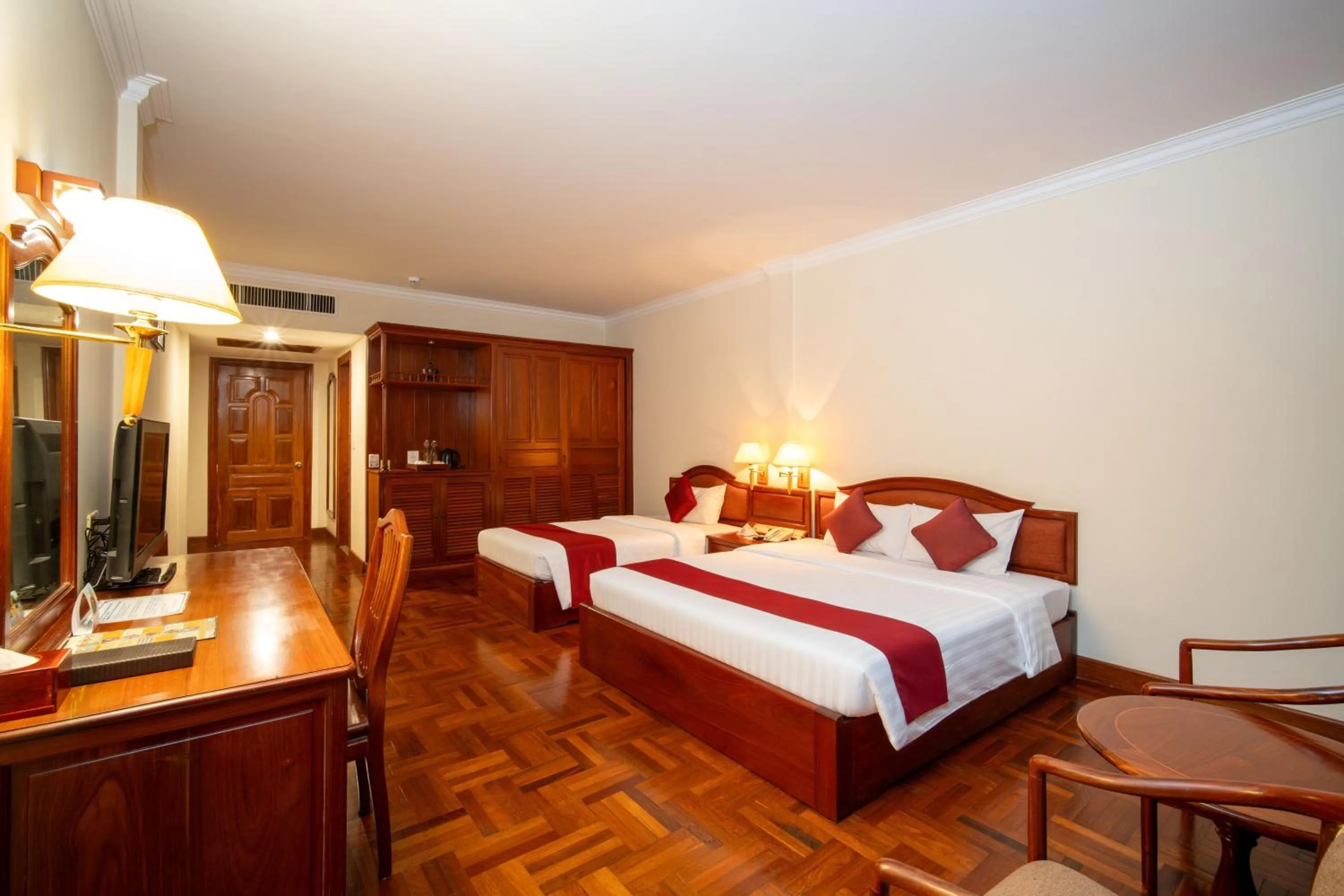 Bed in Khemara Angkor Hotel & Spa