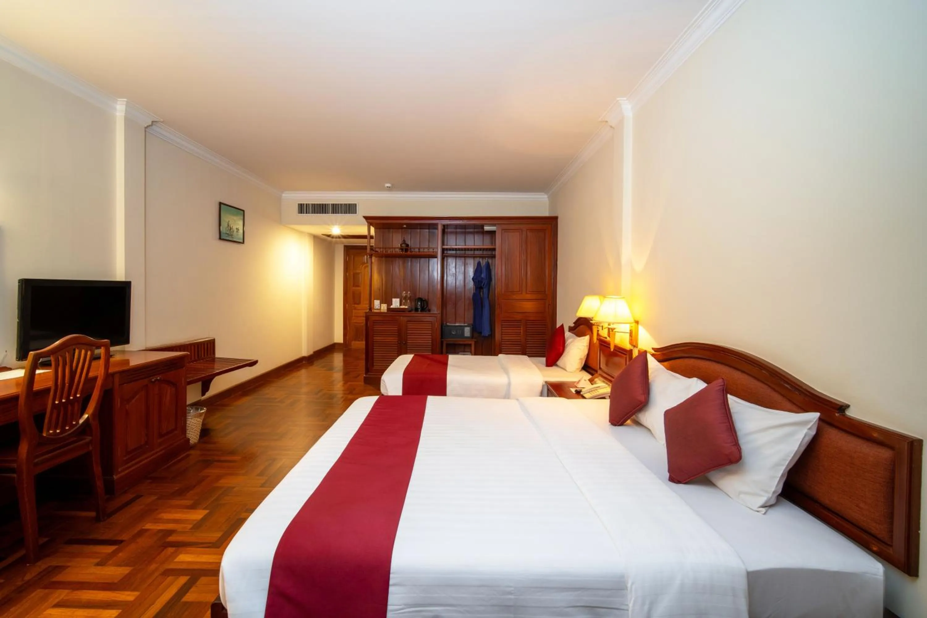 Communal lounge/ TV room, Bed in Khemara Angkor Hotel & Spa