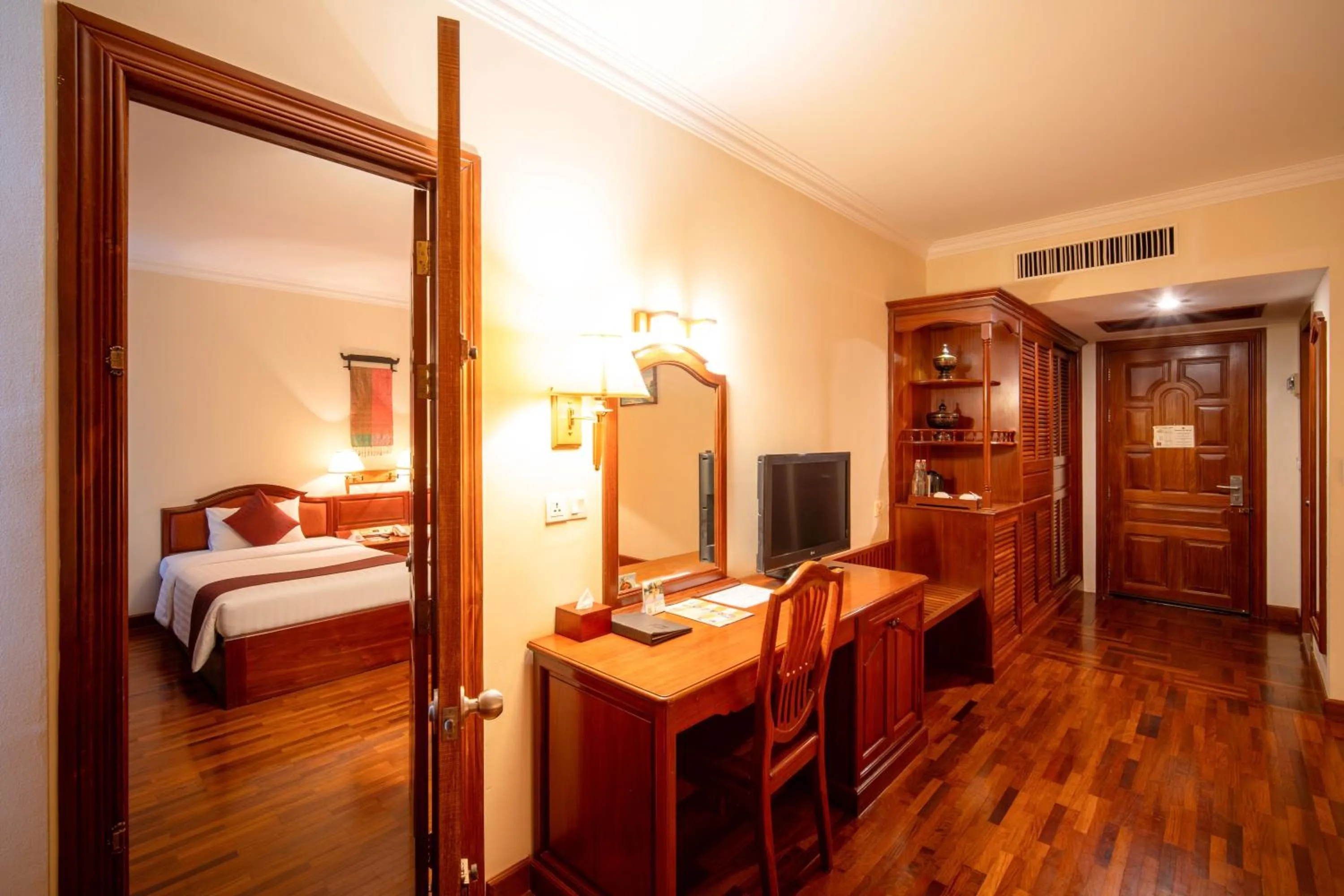 Communal lounge/ TV room, Bed in Khemara Angkor Hotel & Spa