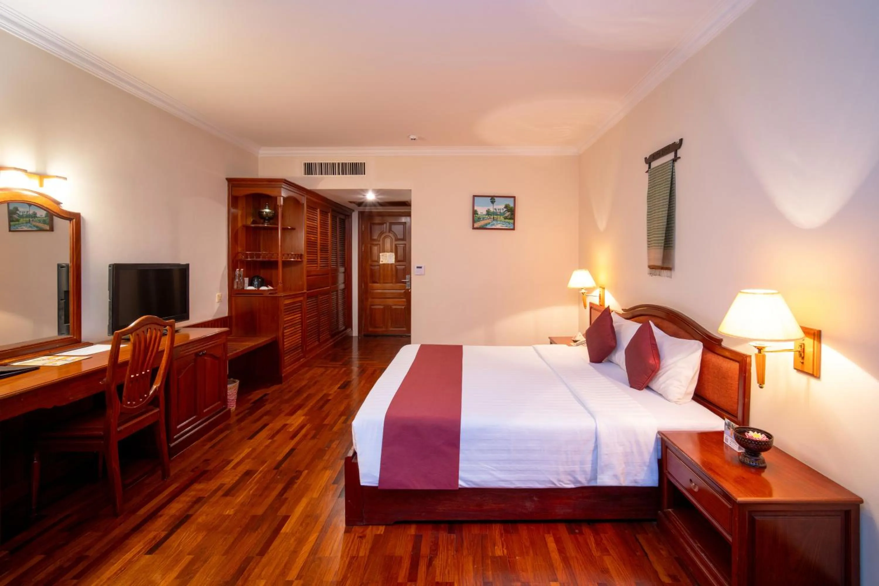 Communal lounge/ TV room, Bed in Khemara Angkor Hotel & Spa