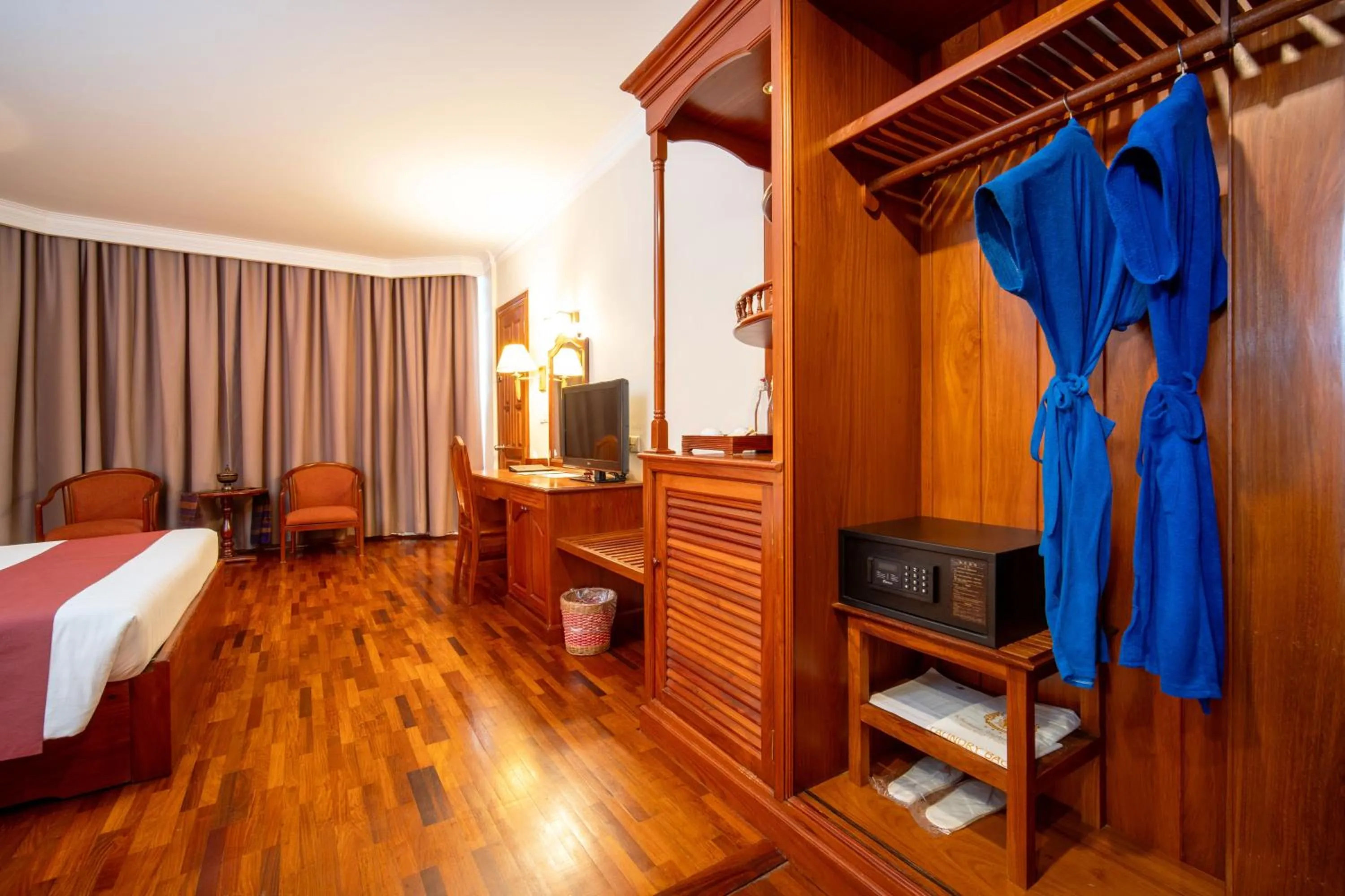 Communal lounge/ TV room, Bed in Khemara Angkor Hotel & Spa