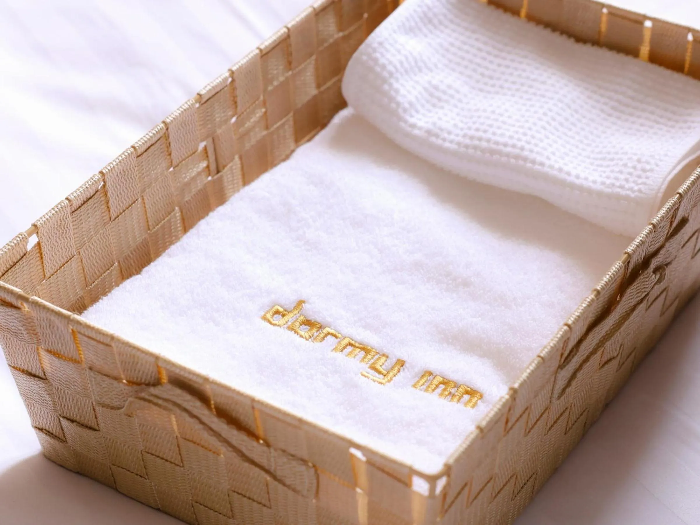 towels, Bed in Dormy Inn Premium Sapporo