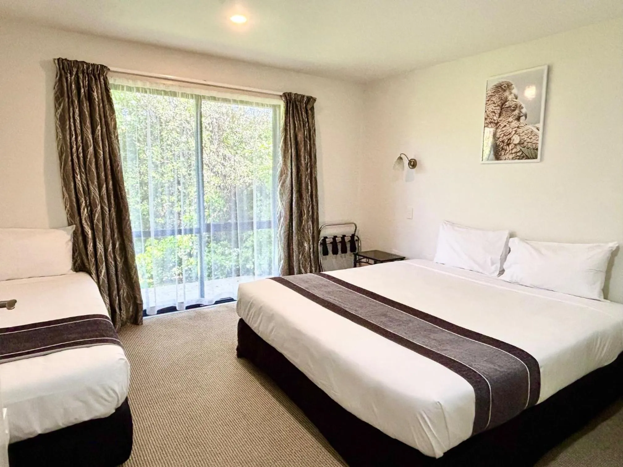 Bed in ASURE Phoenix Motor Inn