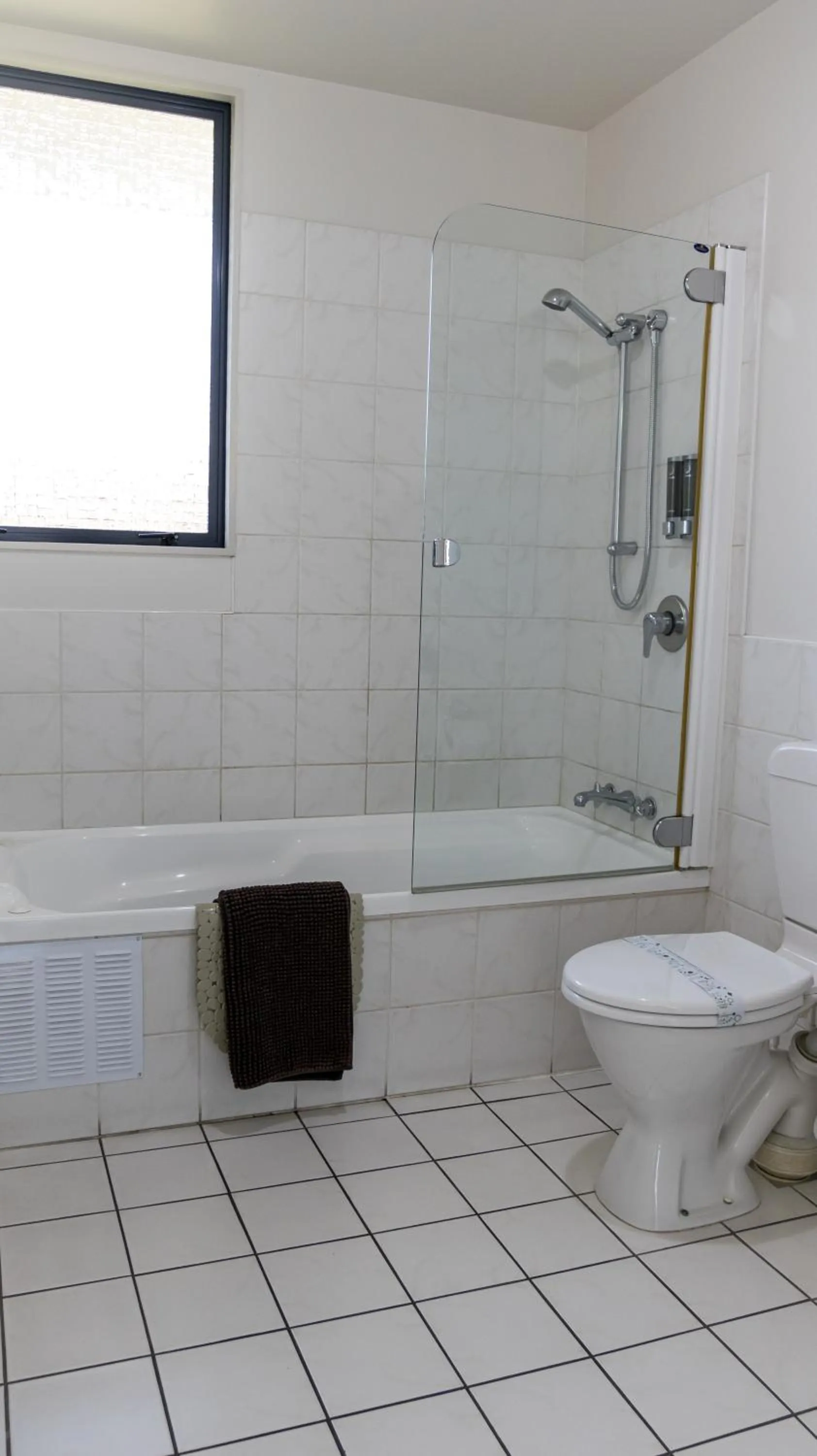 Toilet in ASURE Phoenix Motor Inn