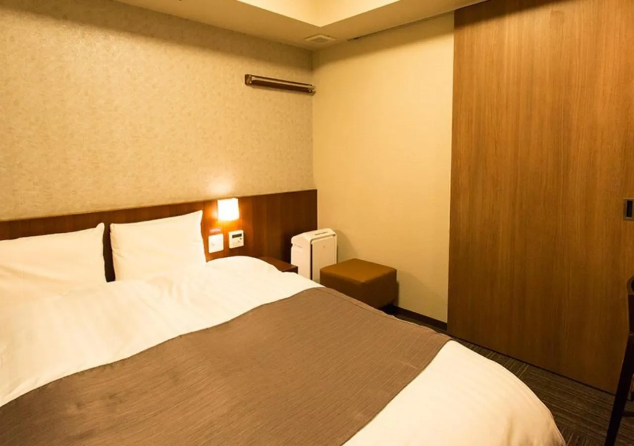 Bed in Dormy Inn Kumamoto Natural Hot Spring