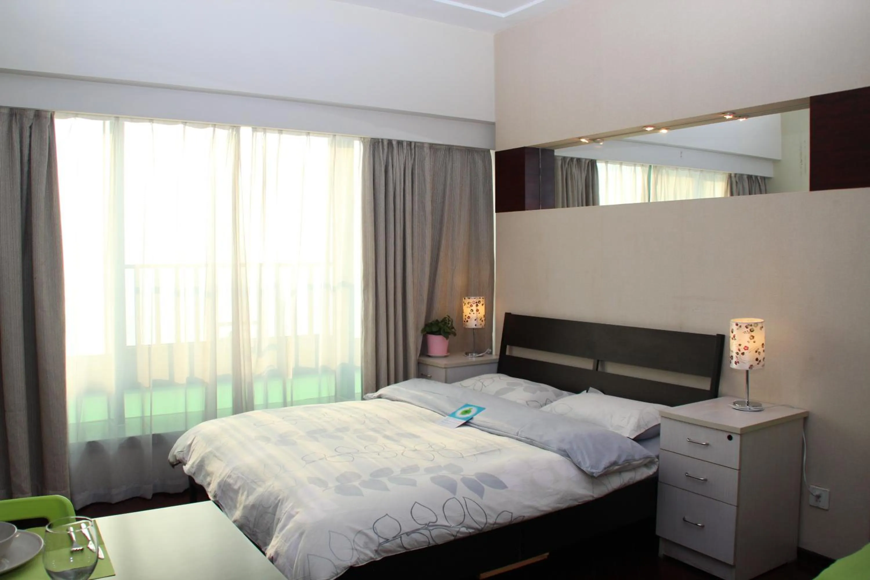 Photo of the whole room, Bed in Shanghai Cosmo World Union Service Apartment