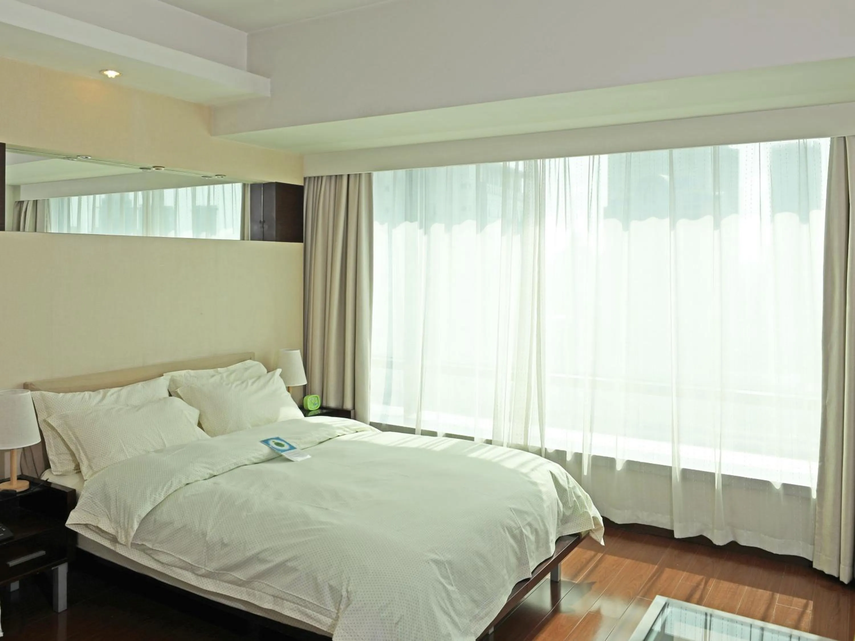 Bed in Shanghai Cosmo World Union Service Apartment