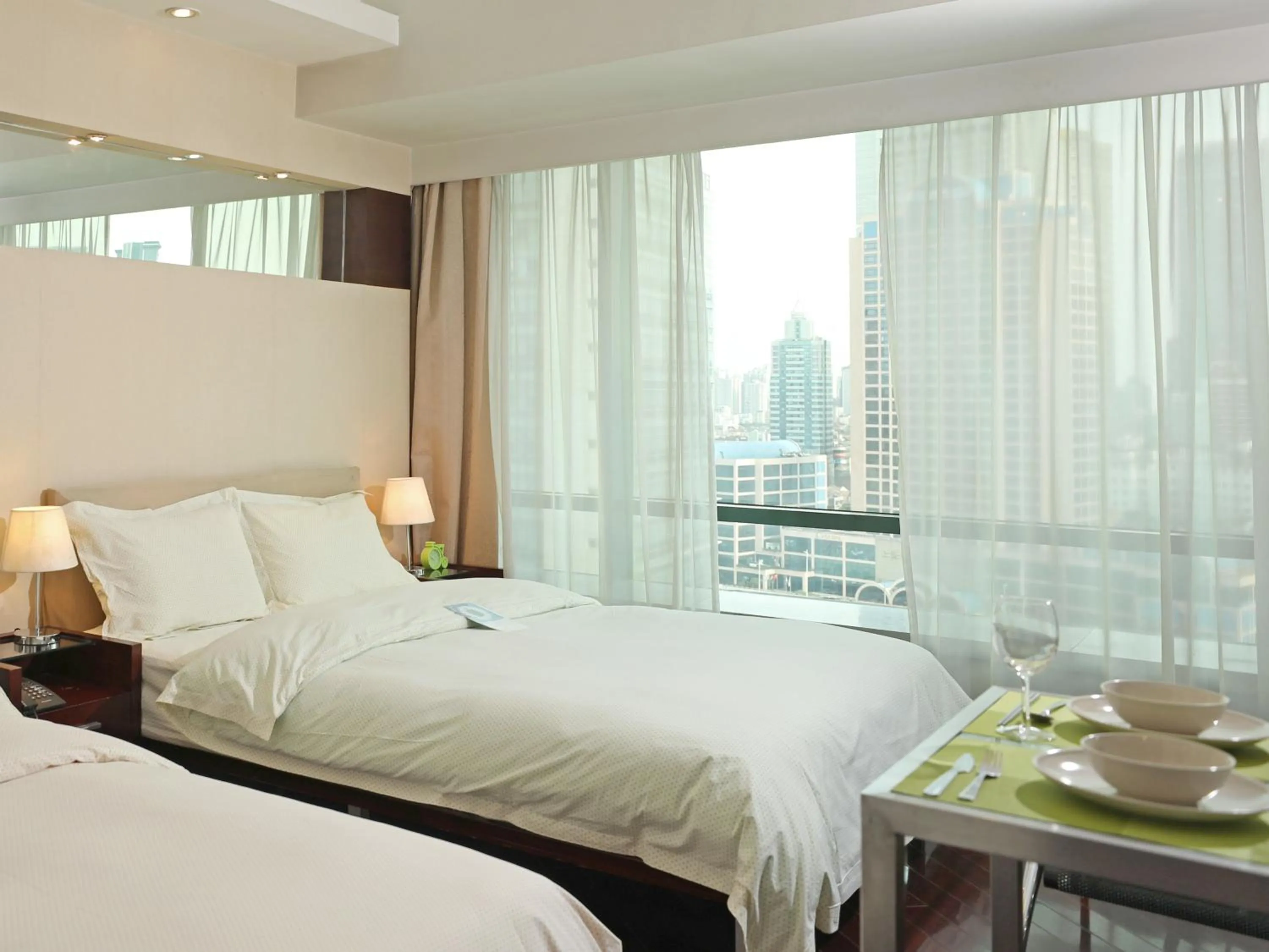 Bed in Shanghai Cosmo World Union Service Apartment