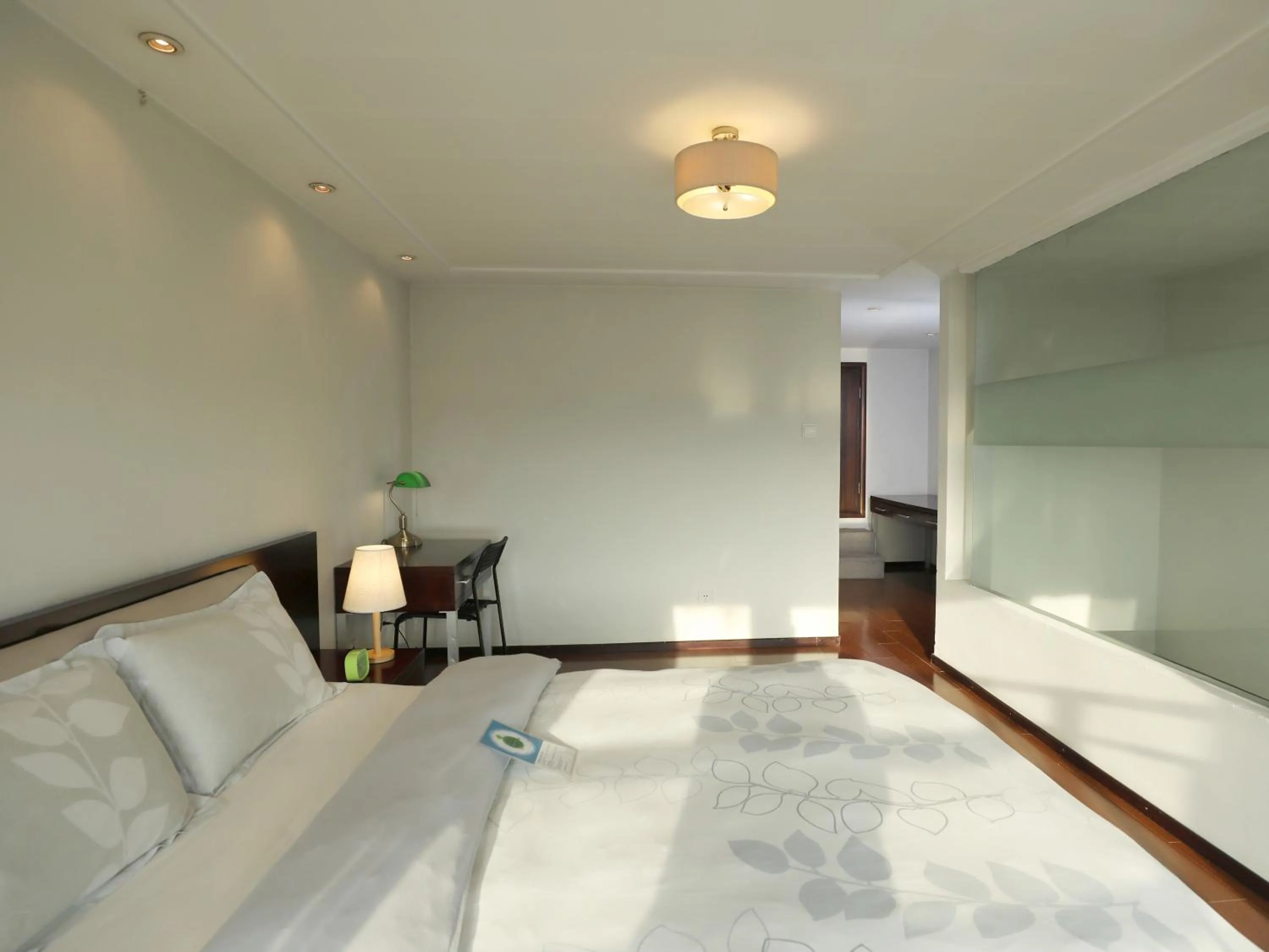 Bed in Shanghai Cosmo World Union Service Apartment