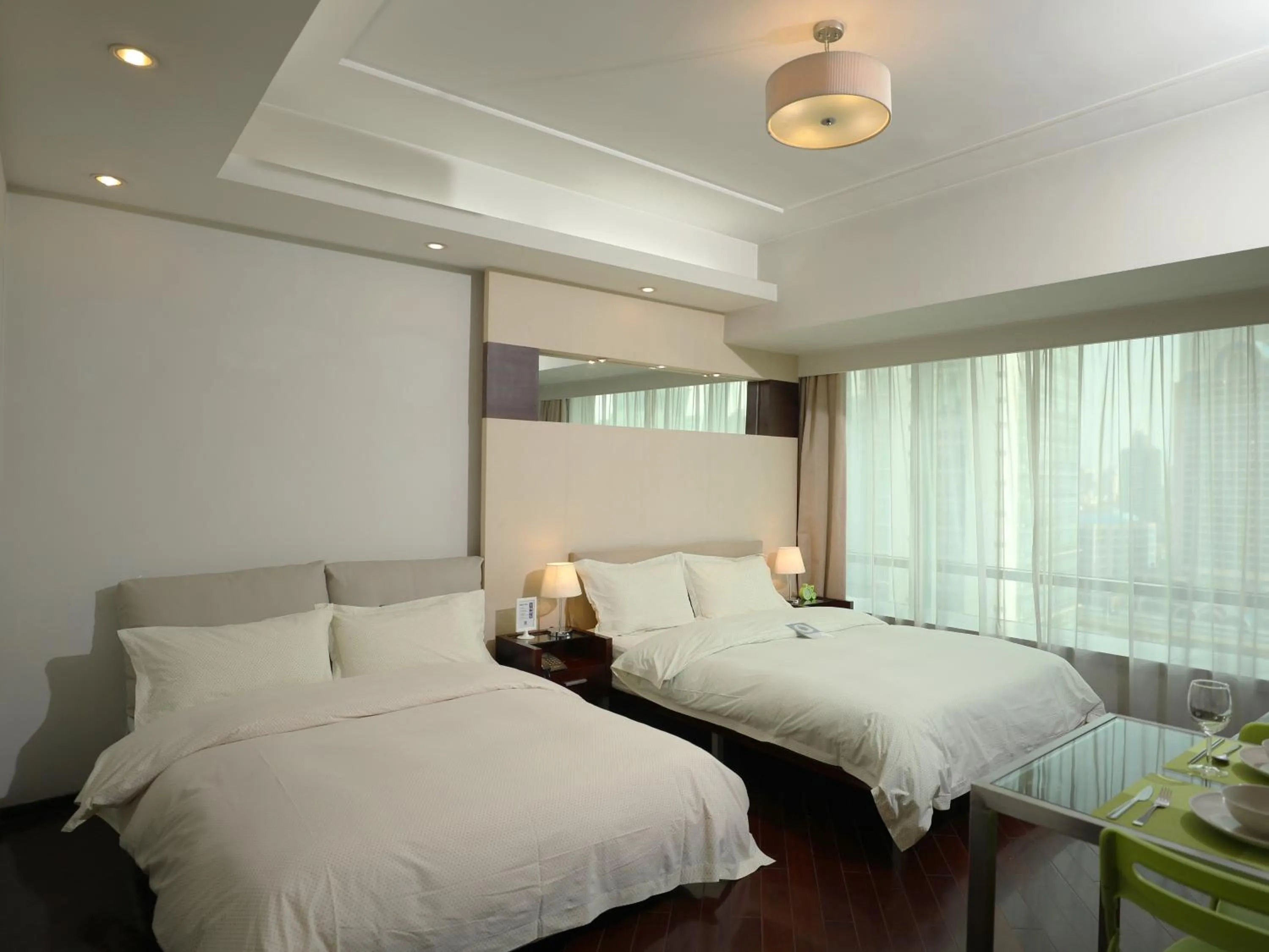 Bed in Shanghai Cosmo World Union Service Apartment